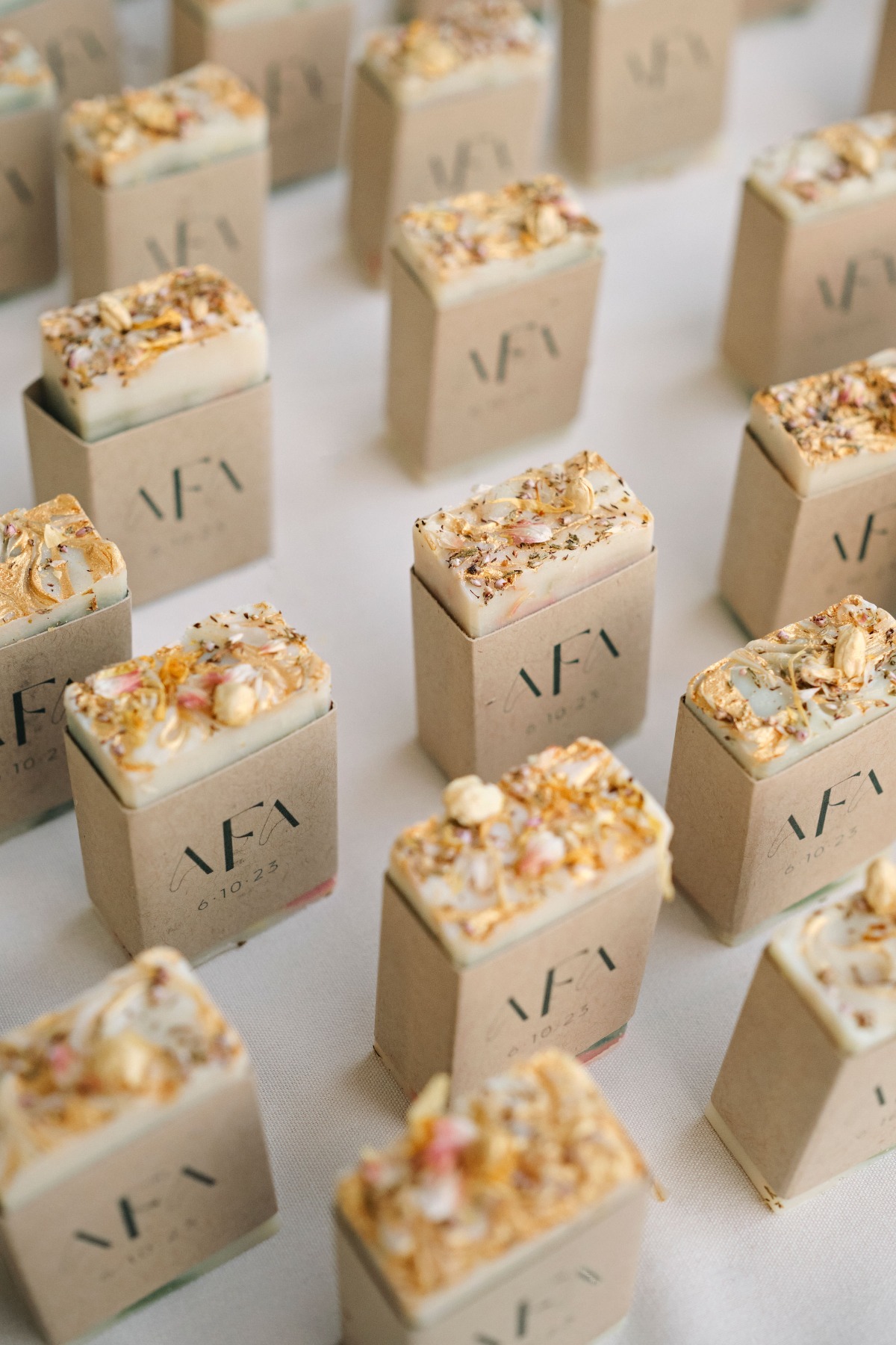Custom floral soap with monogrammed sleeve wedding favors