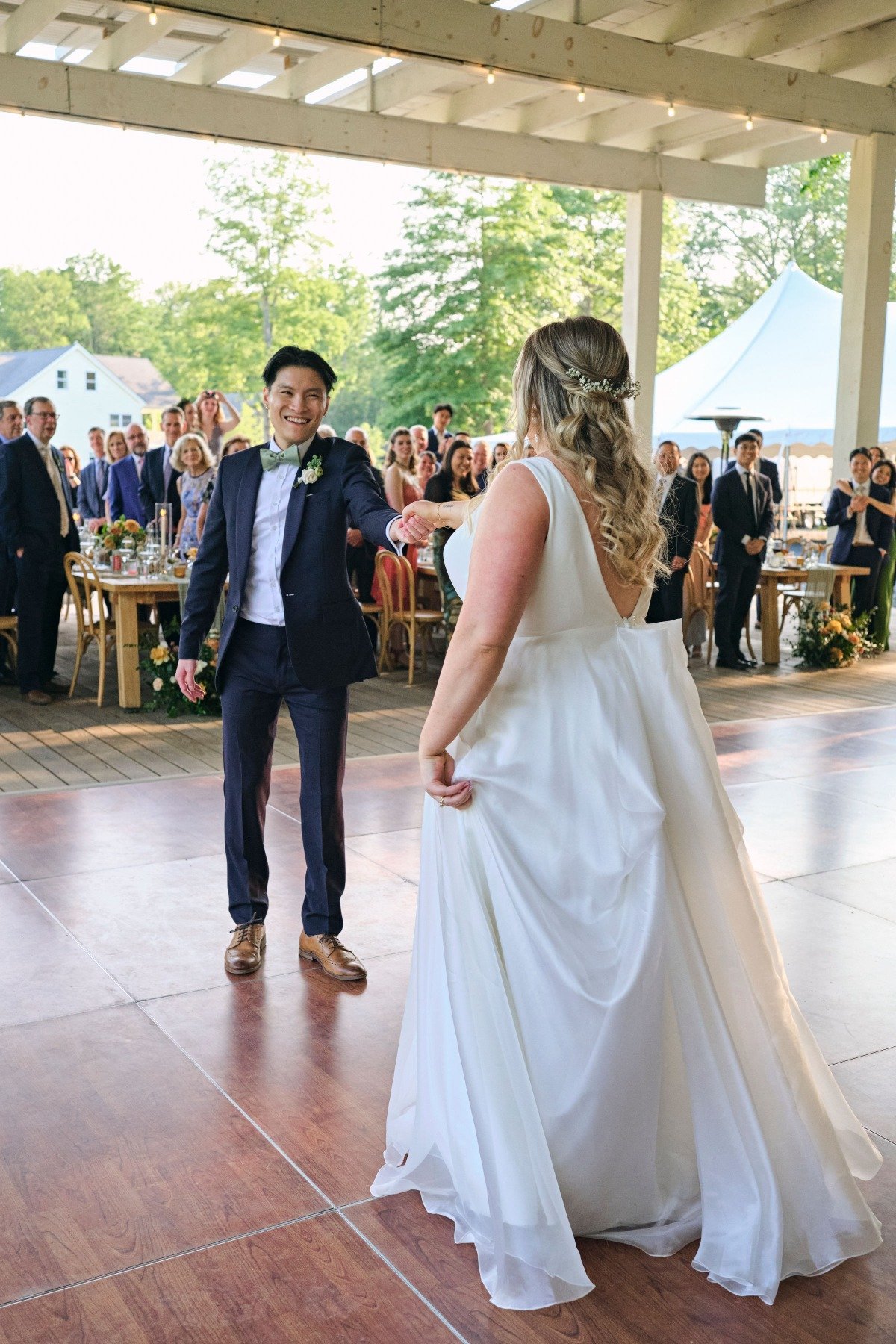 Happy first dance at outdoor wedding reception in Hudson Valley