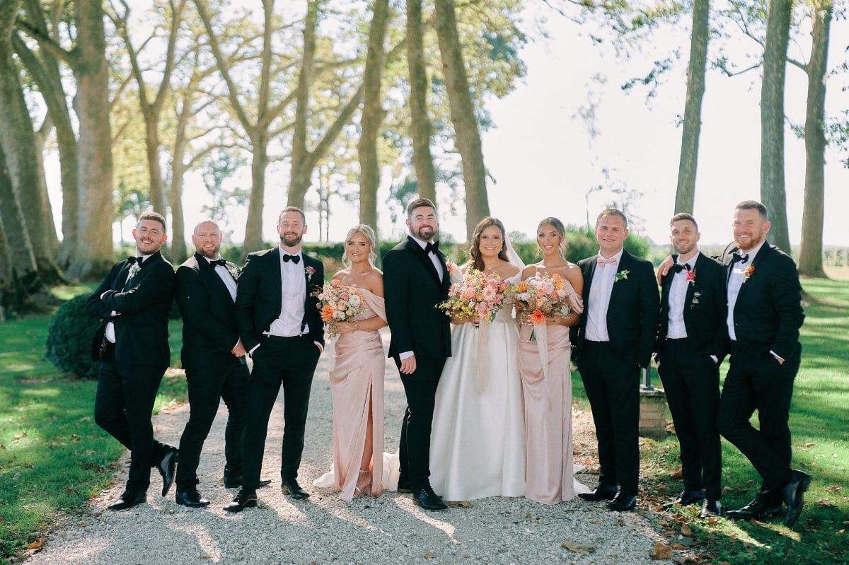 Classic bridal party with pink bridesmaids 
