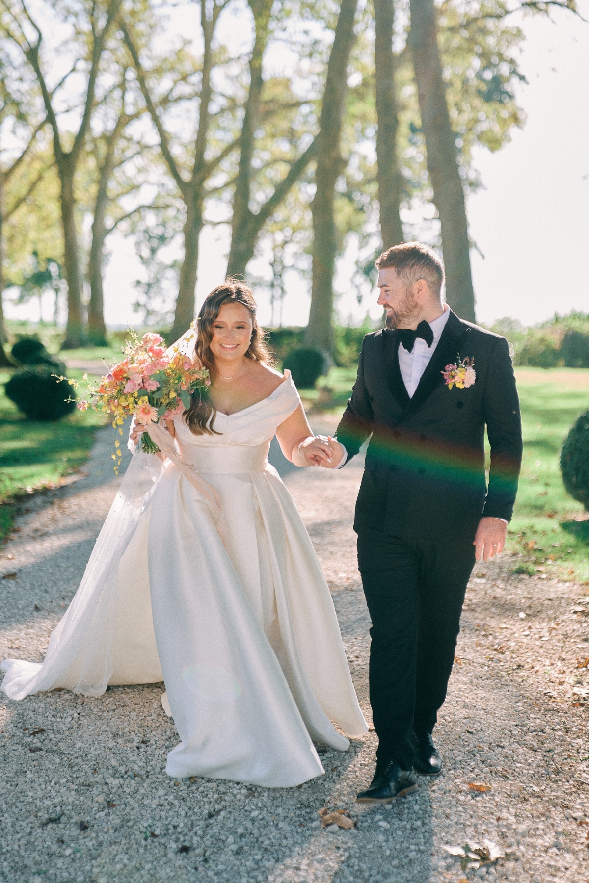 Sun-kissed bride and groom in France