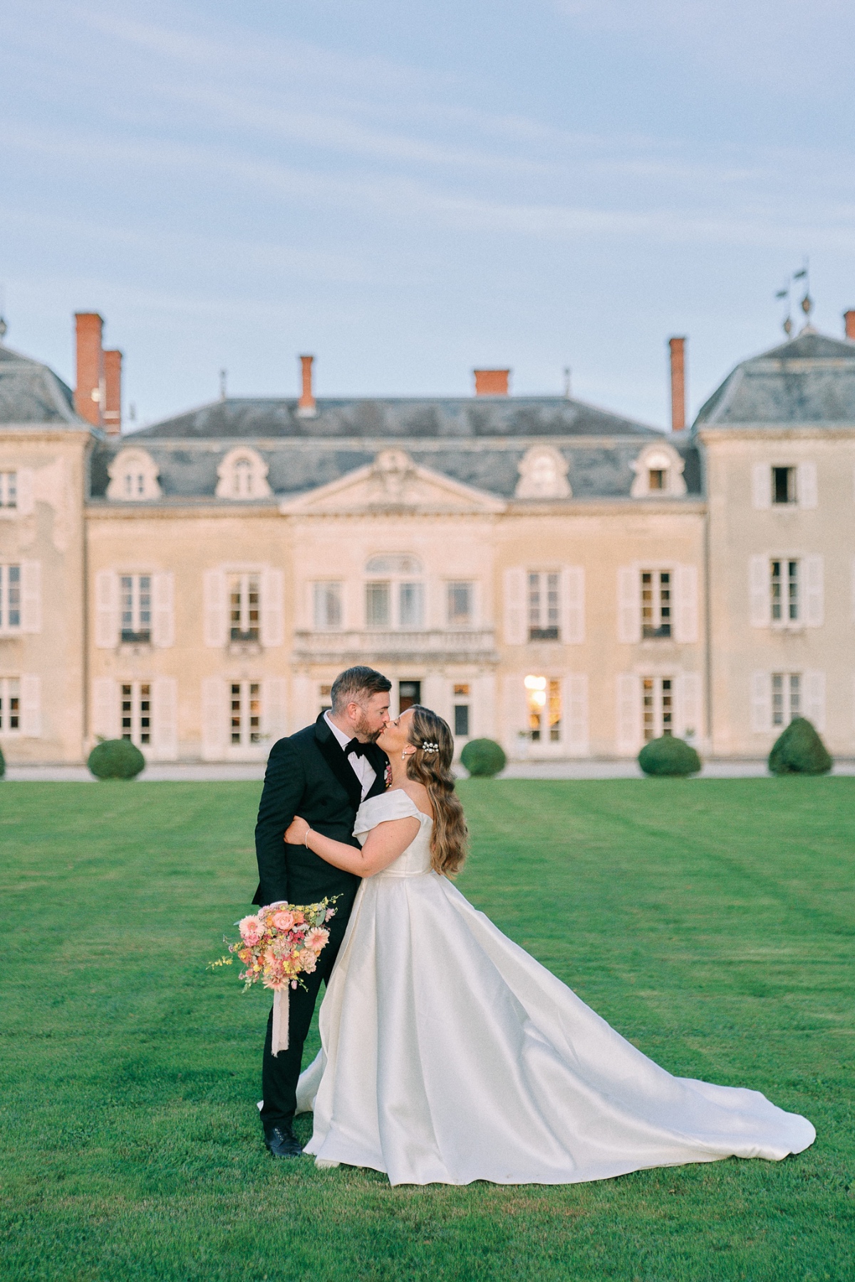 Sunset wedding portraits at French chateau 