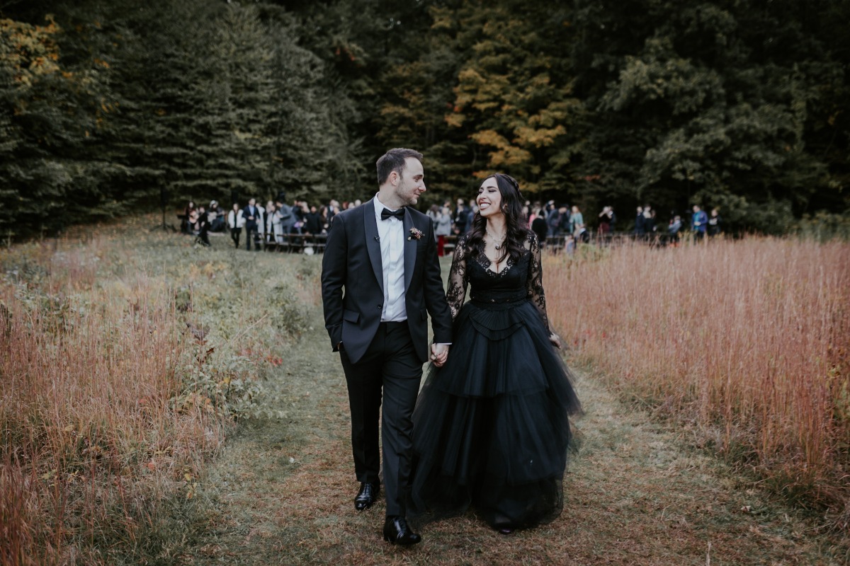 Modern and moody fall wedding fashion for bride and groom