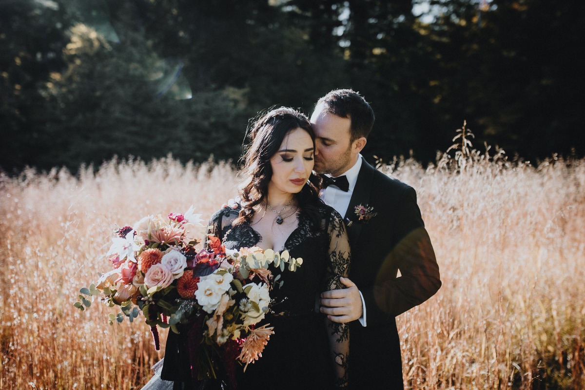 Modern and moody fall wedding with bride in black dress