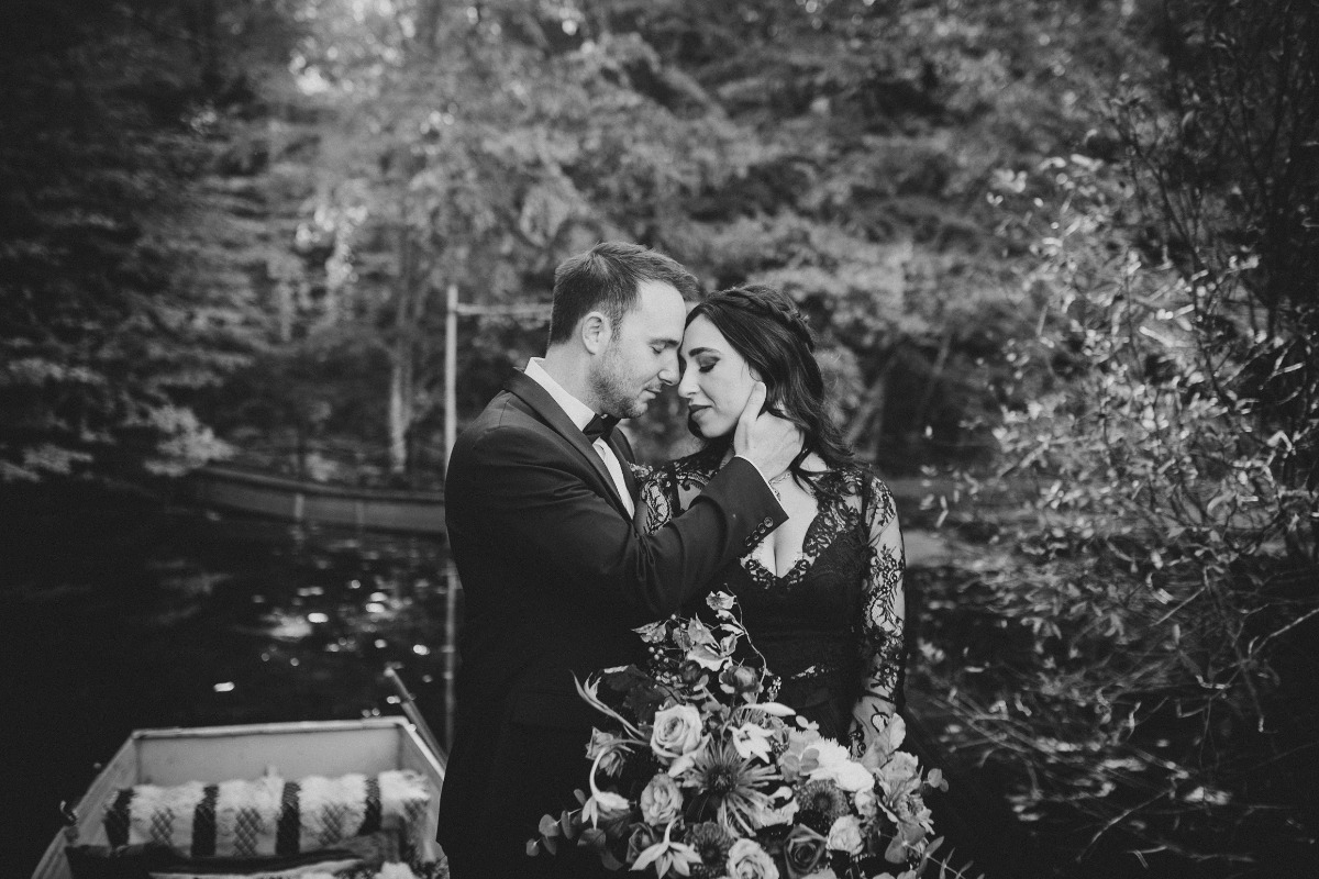 Dark and moody Hudson Valley wedding with vintage boat