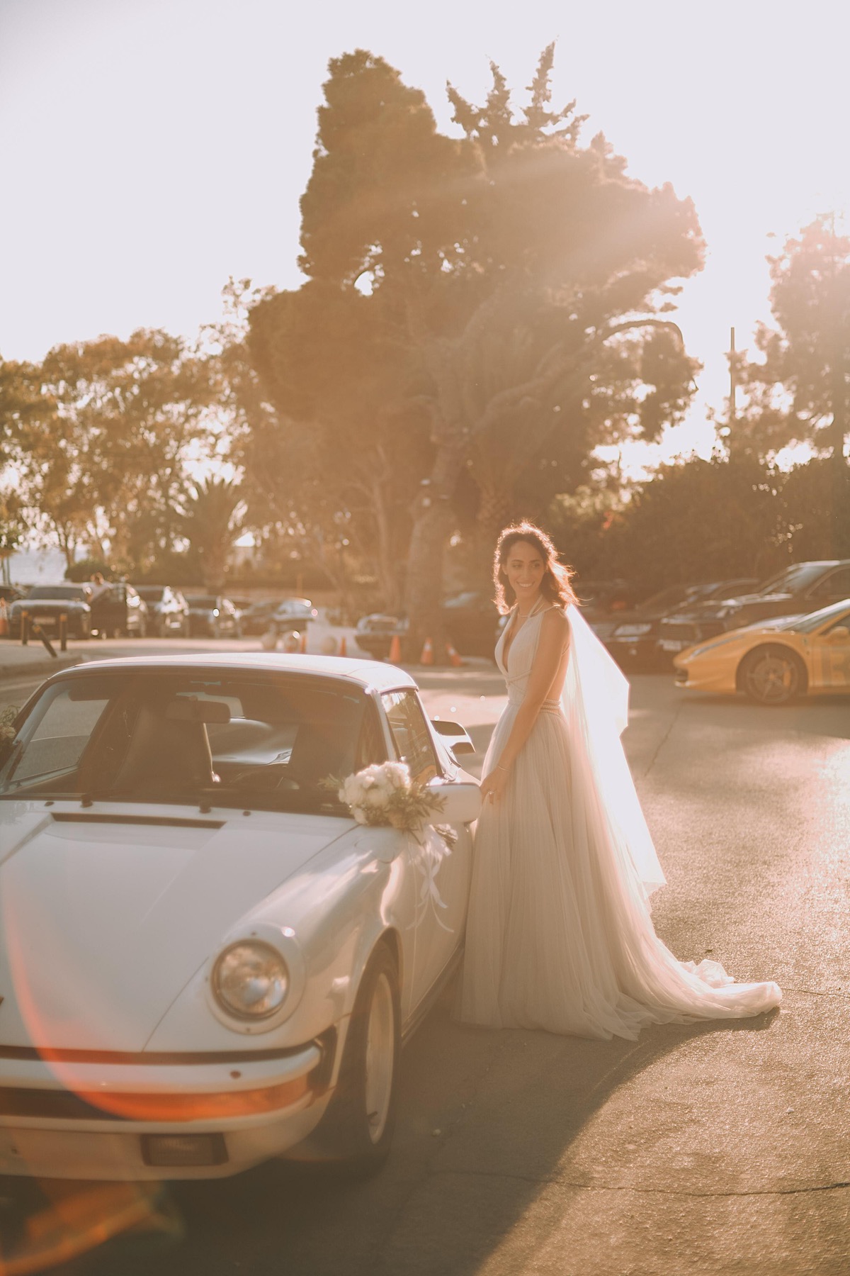 Destination wedding bride in Greece with vintage car