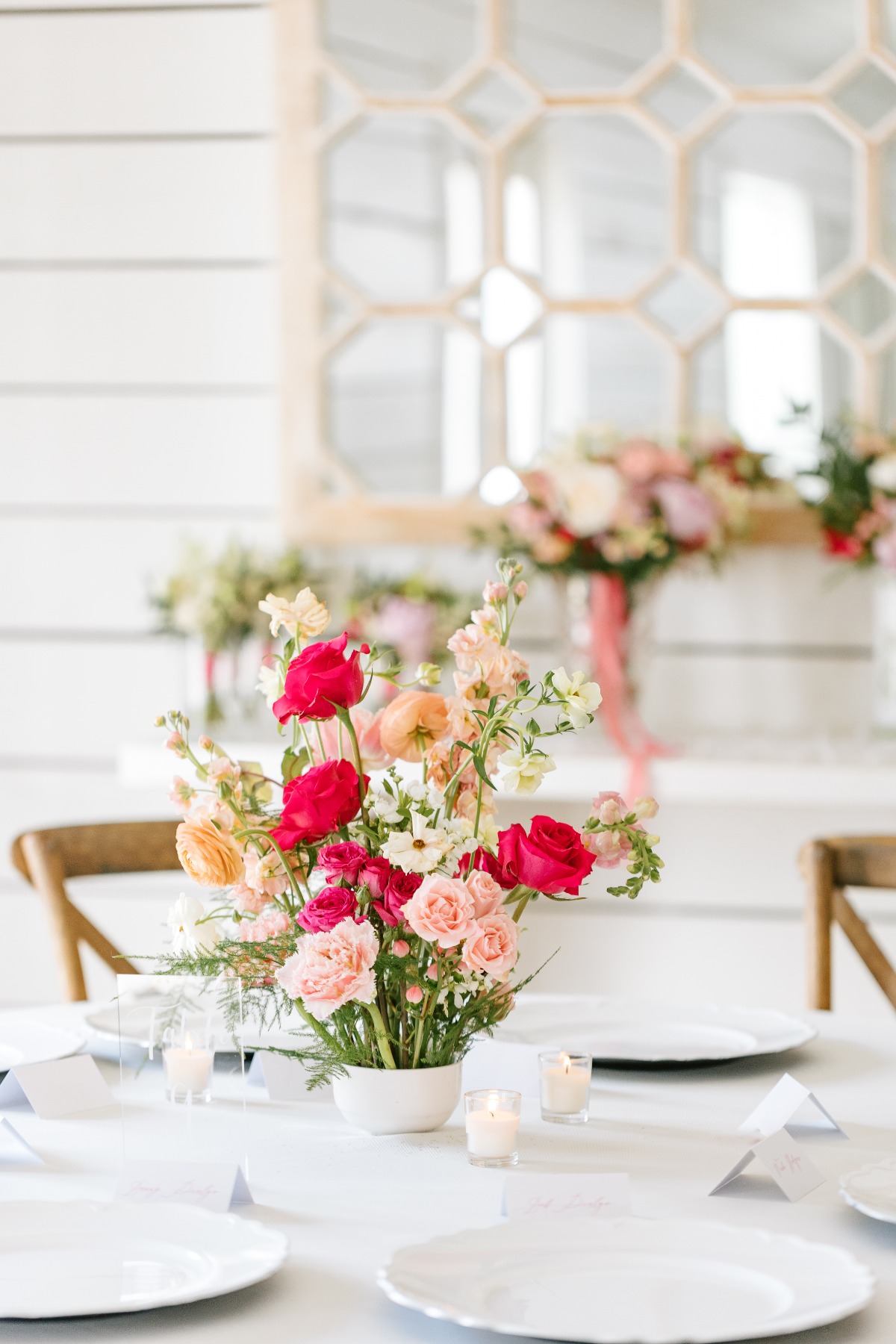 Pink and peach floral centerpieces for wedding reception