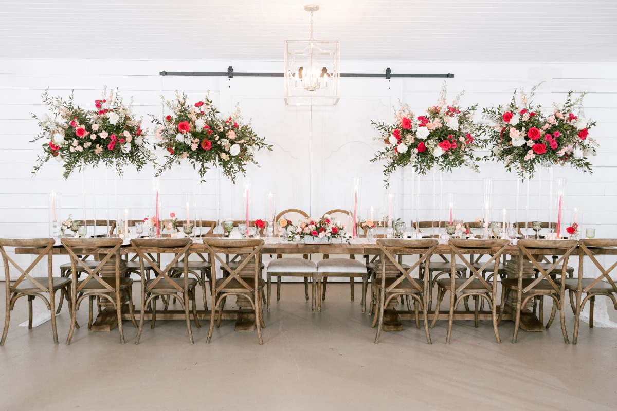Pink Barbie inspired wedding reception with floating florals