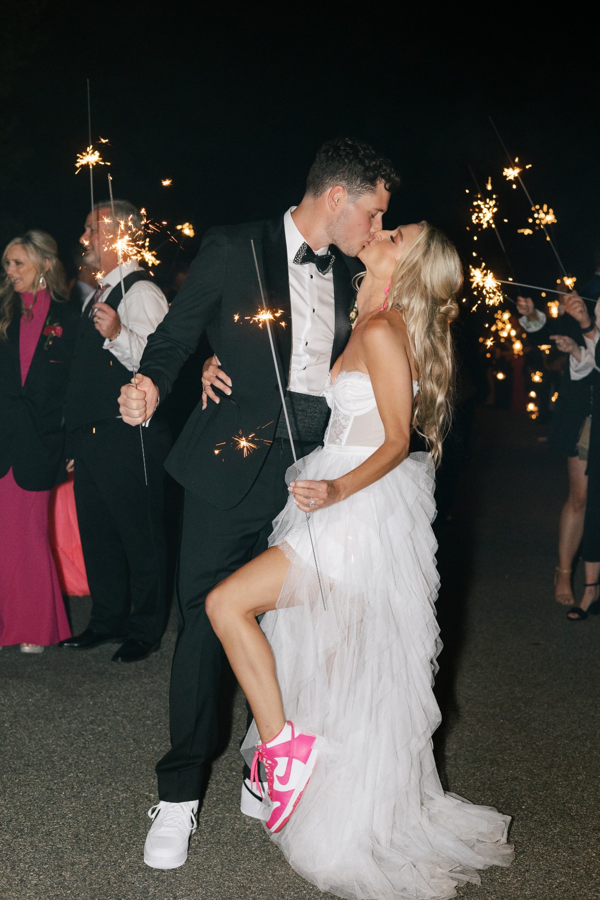 Newlyweds kiss at sparkler grand exit at Georgia wedding
