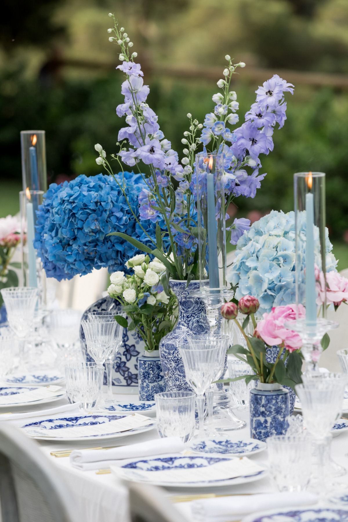 blue purple and pops of pink centerpieces