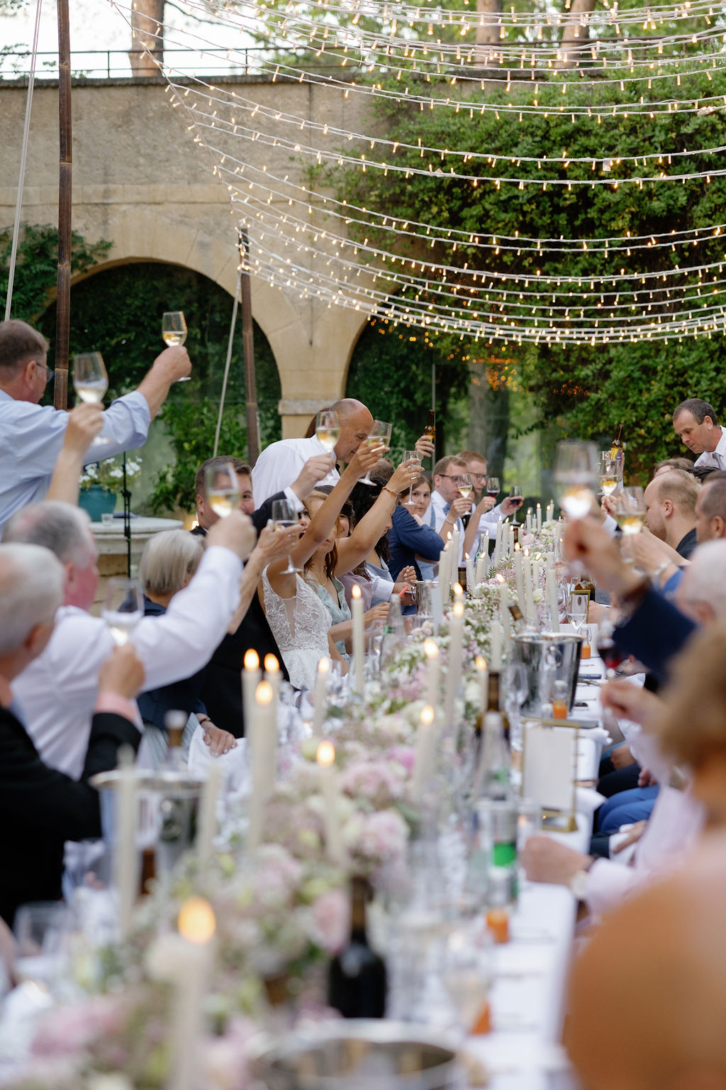 Toast at elegant French wedding reception in Provence 