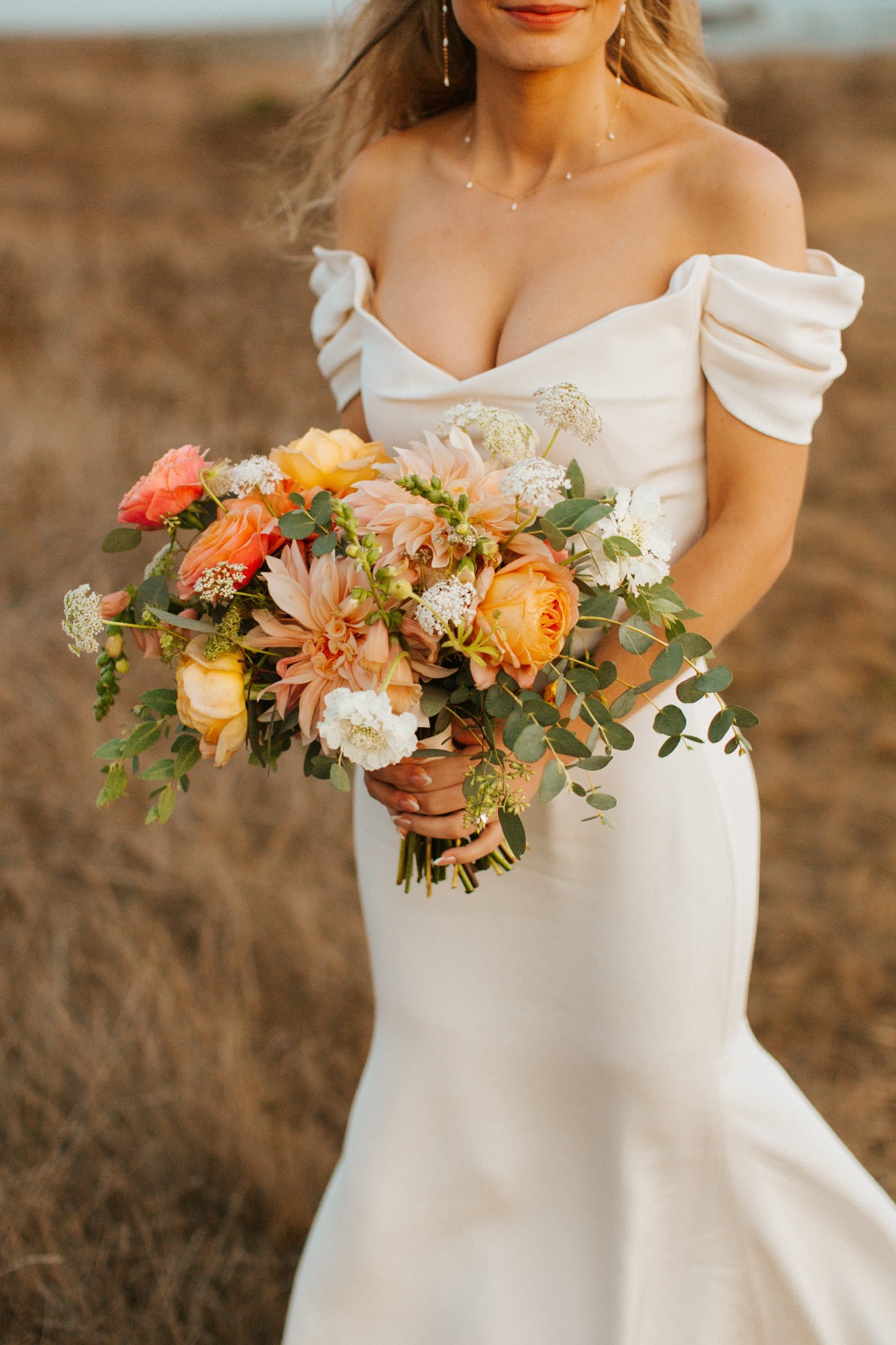 wedding bouquet with roses and eucalyptus