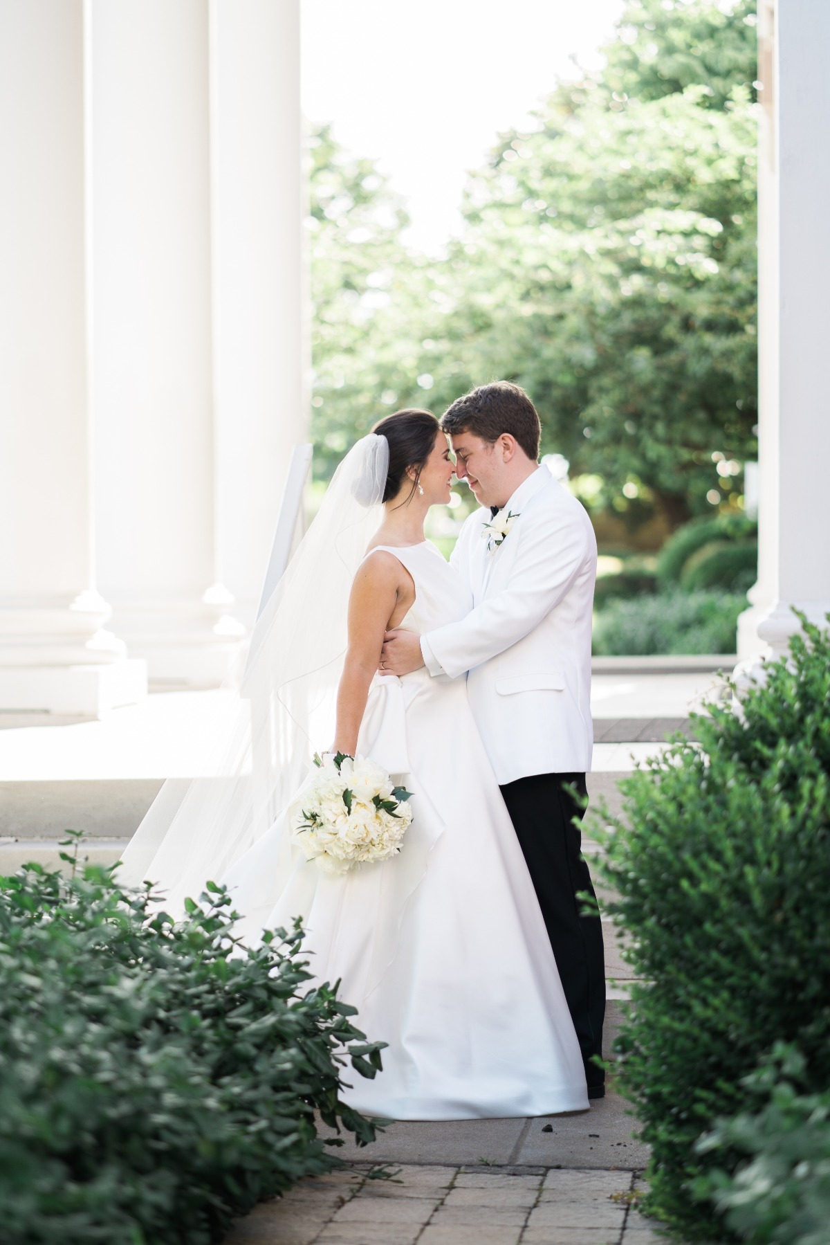 Timeless bride and groom at chapel wedding 