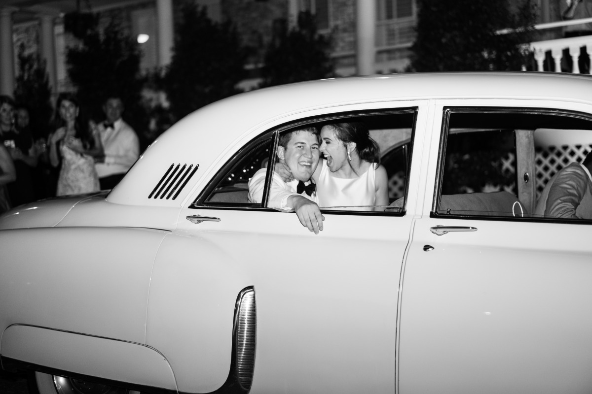 Grand wedding exit with vintage car 