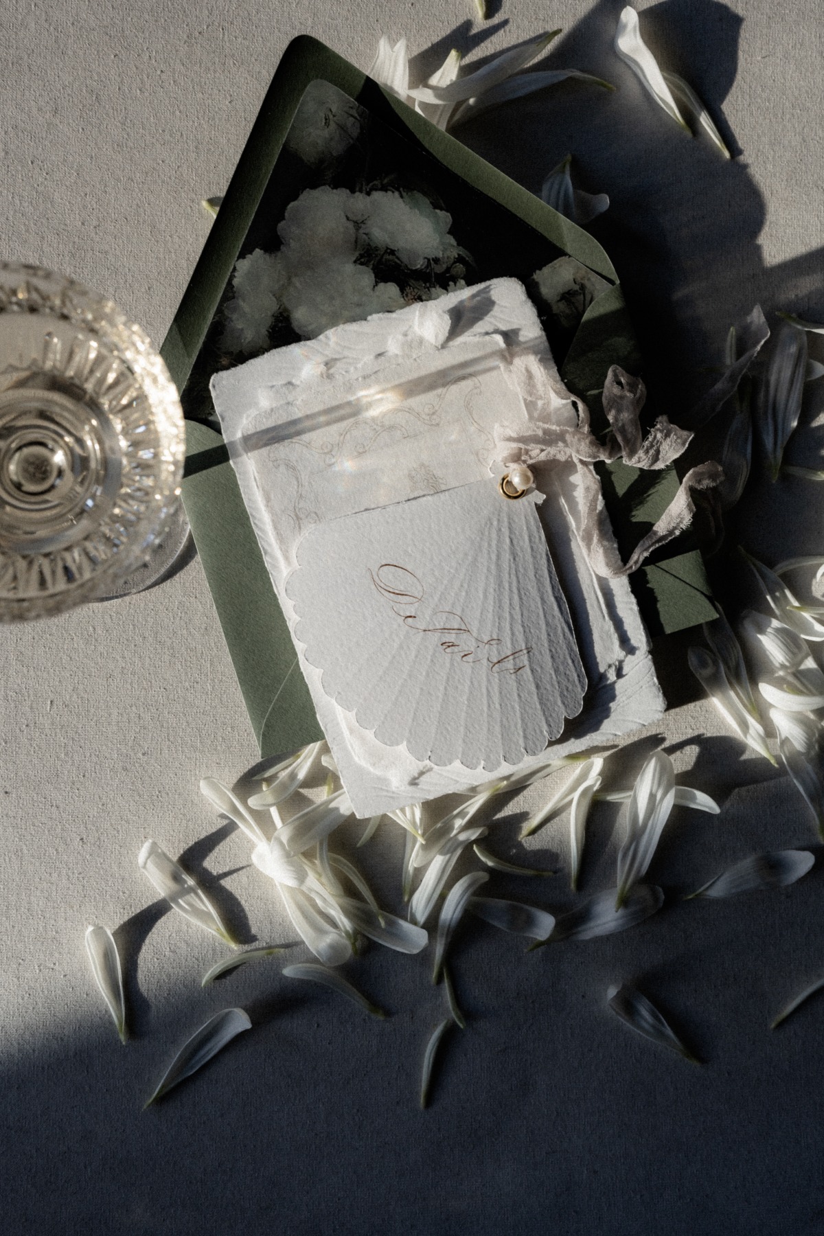 Elegant coastal wedding invitation shaped like a seashell