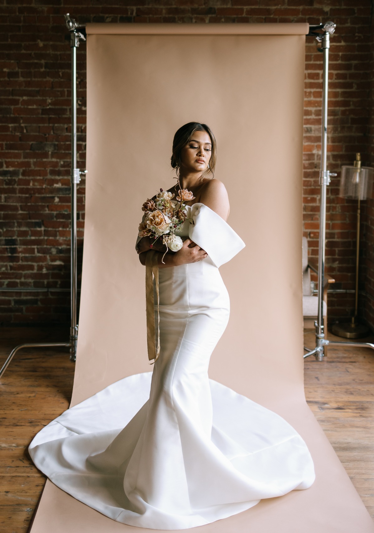 Avant-garde designer wedding gown on chic and modern bride