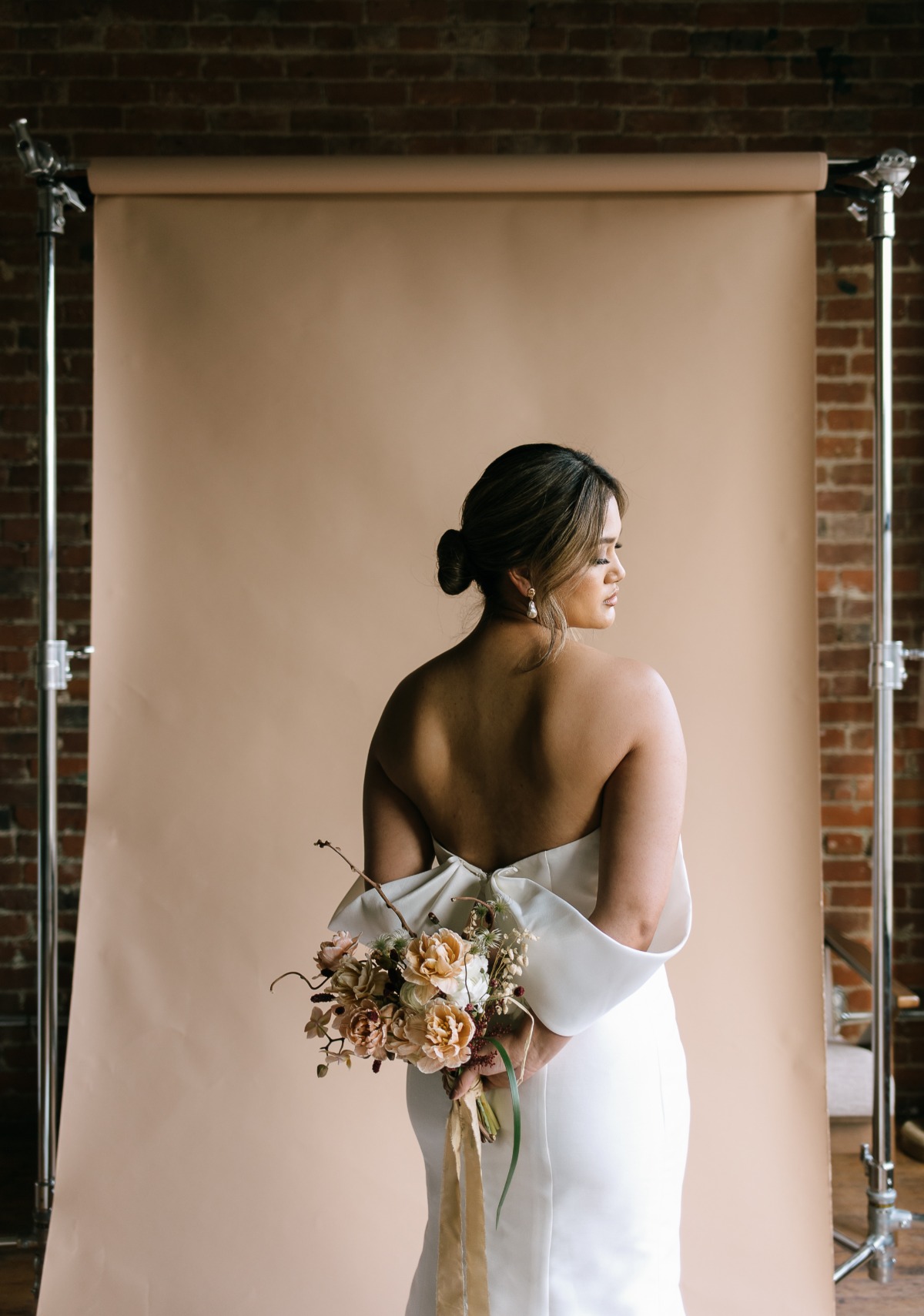 Unique couture wedding dress with open back and unique detailing