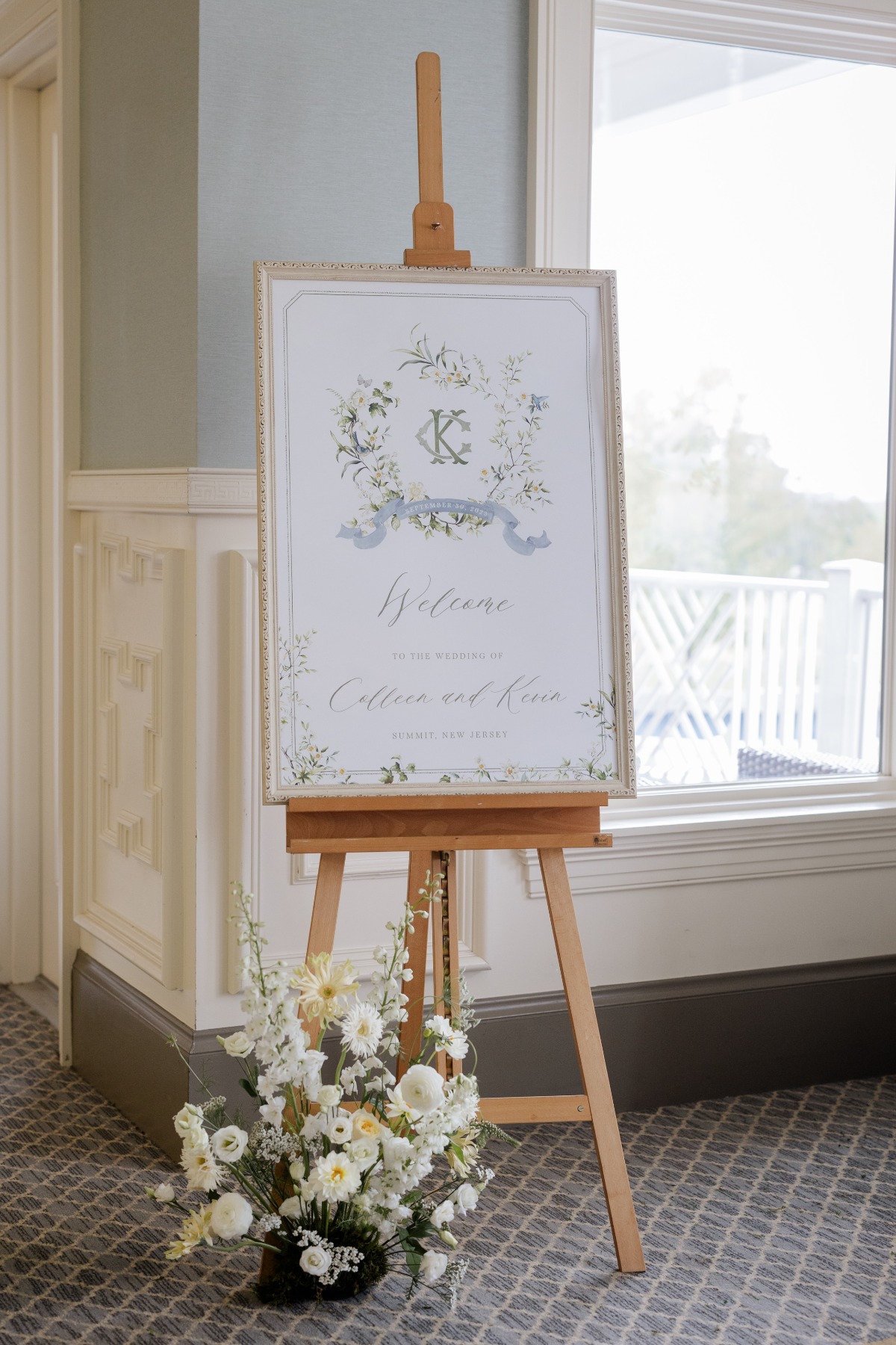 watercolor wedding welcome sign on easel