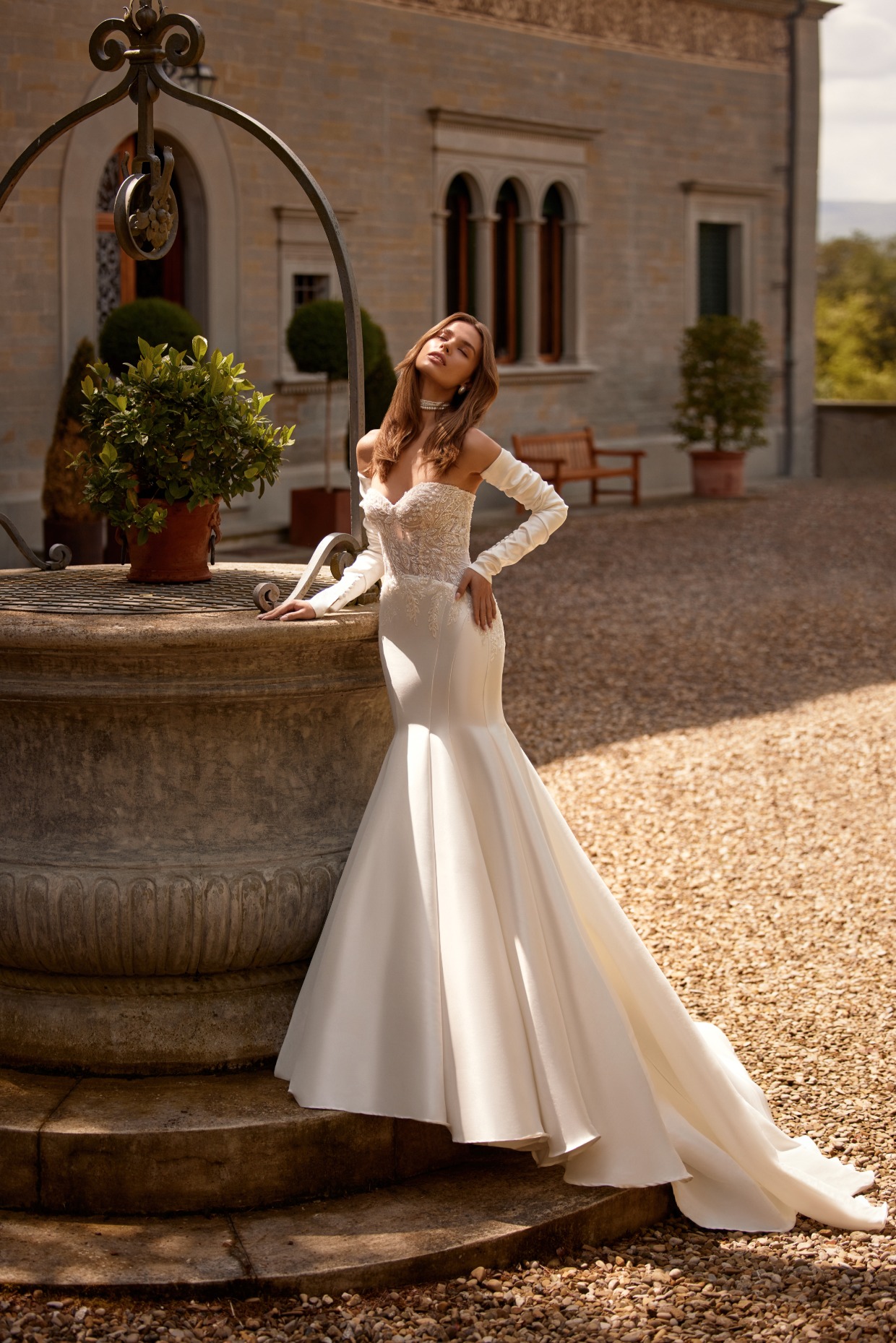 strapless mermaid wedding gown with detachable sleeves