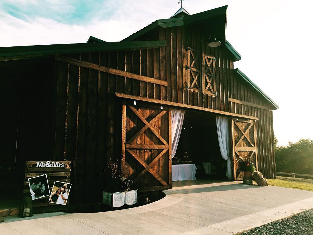 dark wood barn wedding venue in West Virginia The Barn at Woodbridge