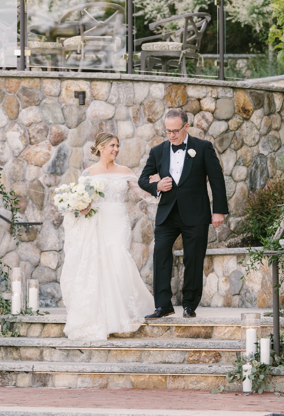 Timeless Cape Cod bride walking down steps with father 