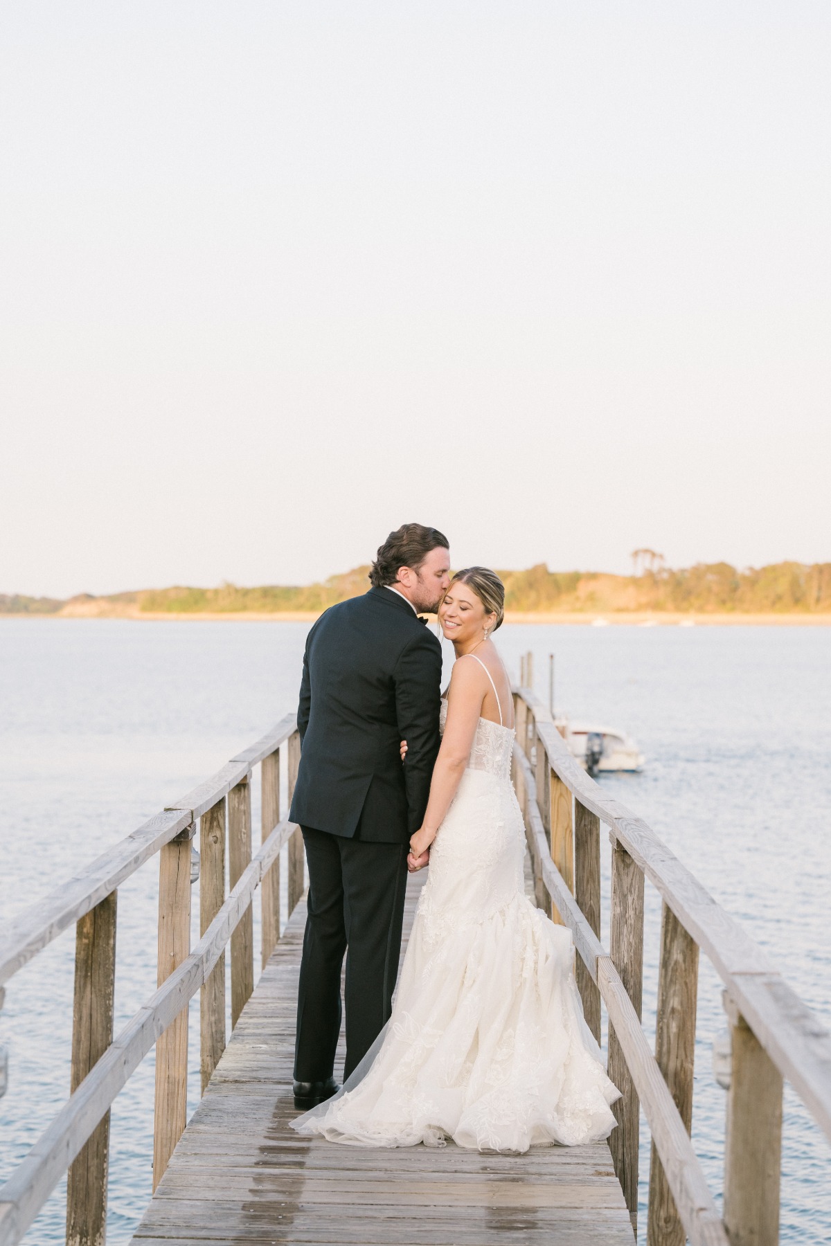 Cape Cod bride and groom sunset portraits on wooden dock