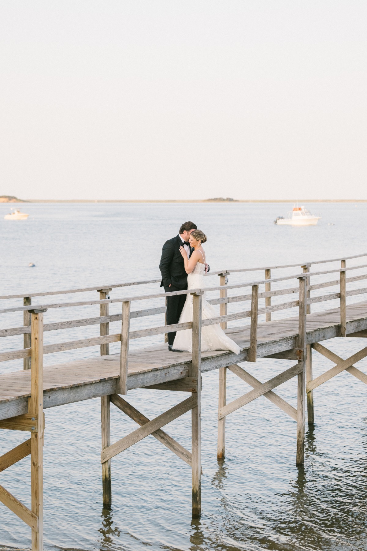 Cape Cod bride and groom wedding portraits on wooden pier