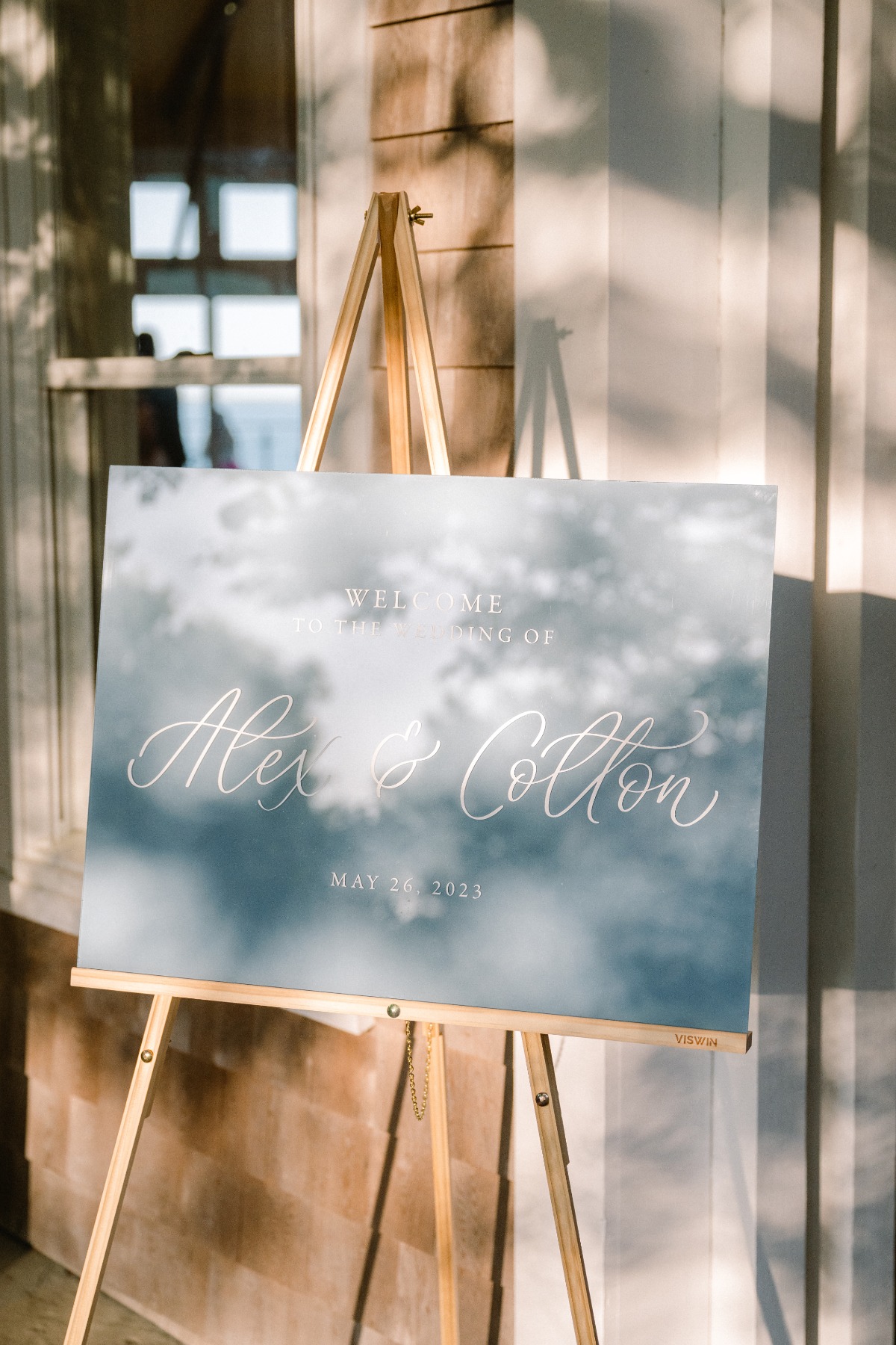 Minimalist baby blue and white wedding welcome sign 