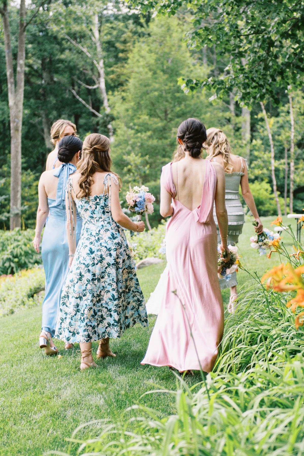 Back of pastel bridesmaids dresses for garden wedding 
