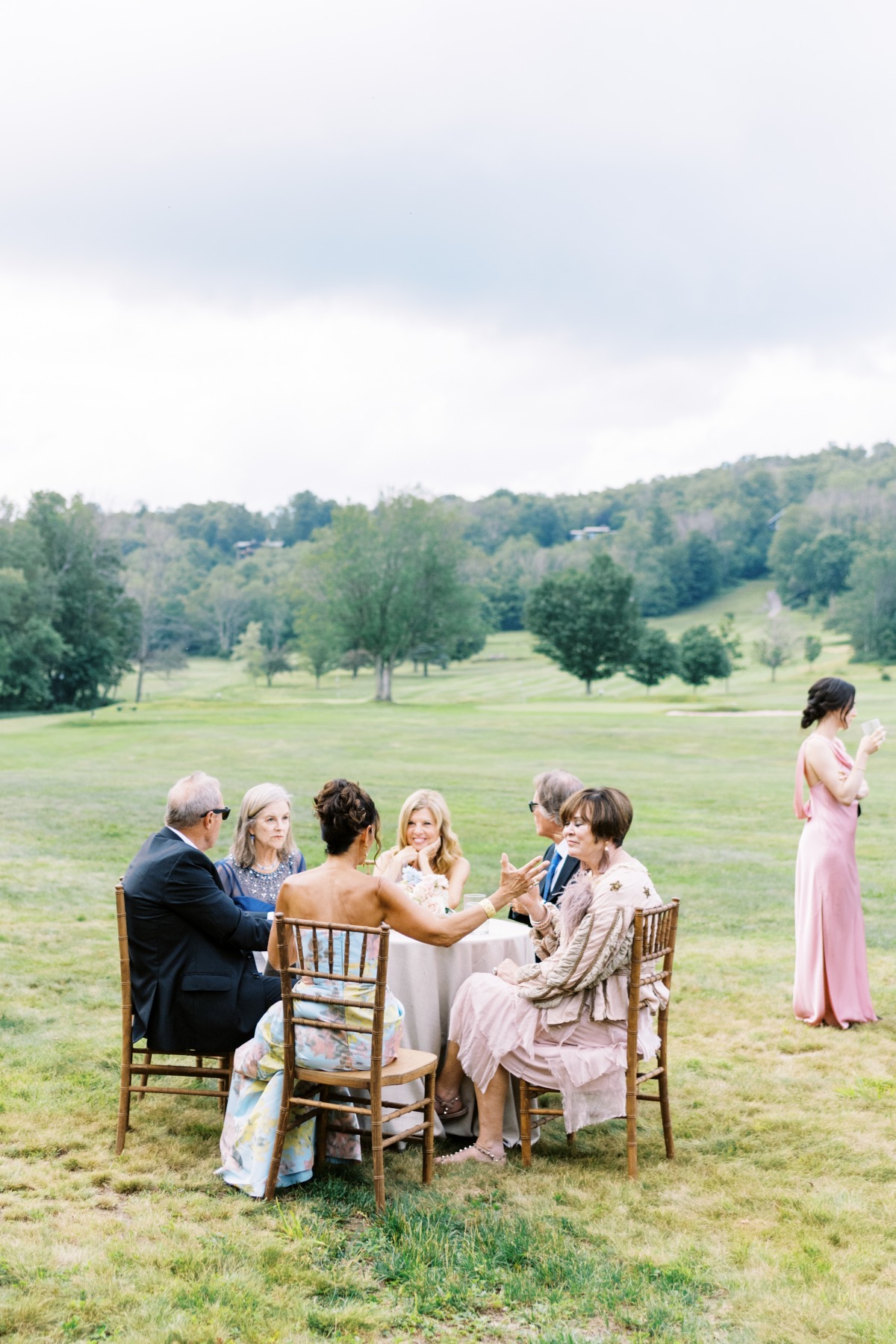 Guests enjoying outdoor cocktail hour at Catskills wedding