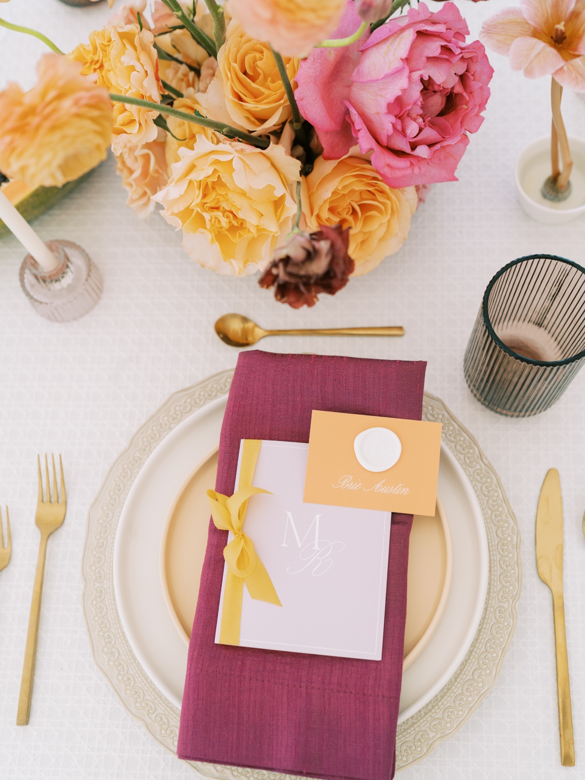 magenta and yellow place settings