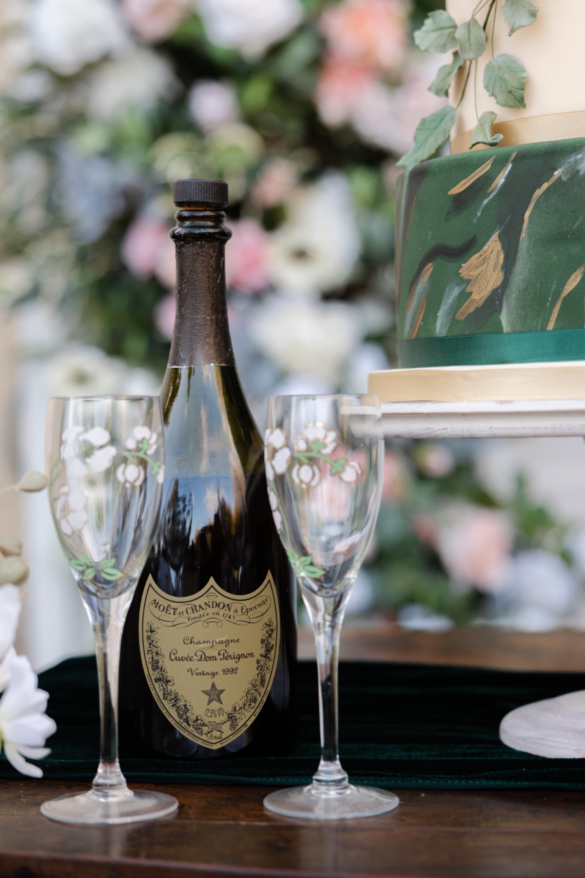 Luxury French wedding champagne with floral glass flutes