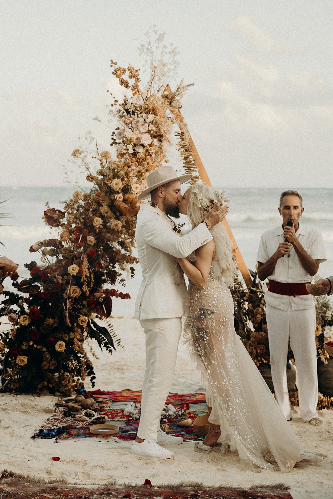 First kiss at boho wedding in Tulum 