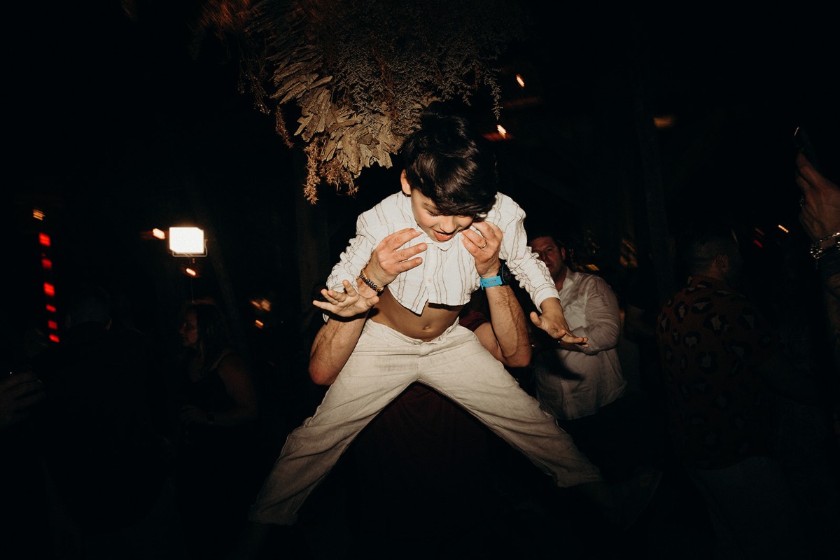 Son of the newlyweds dancing 