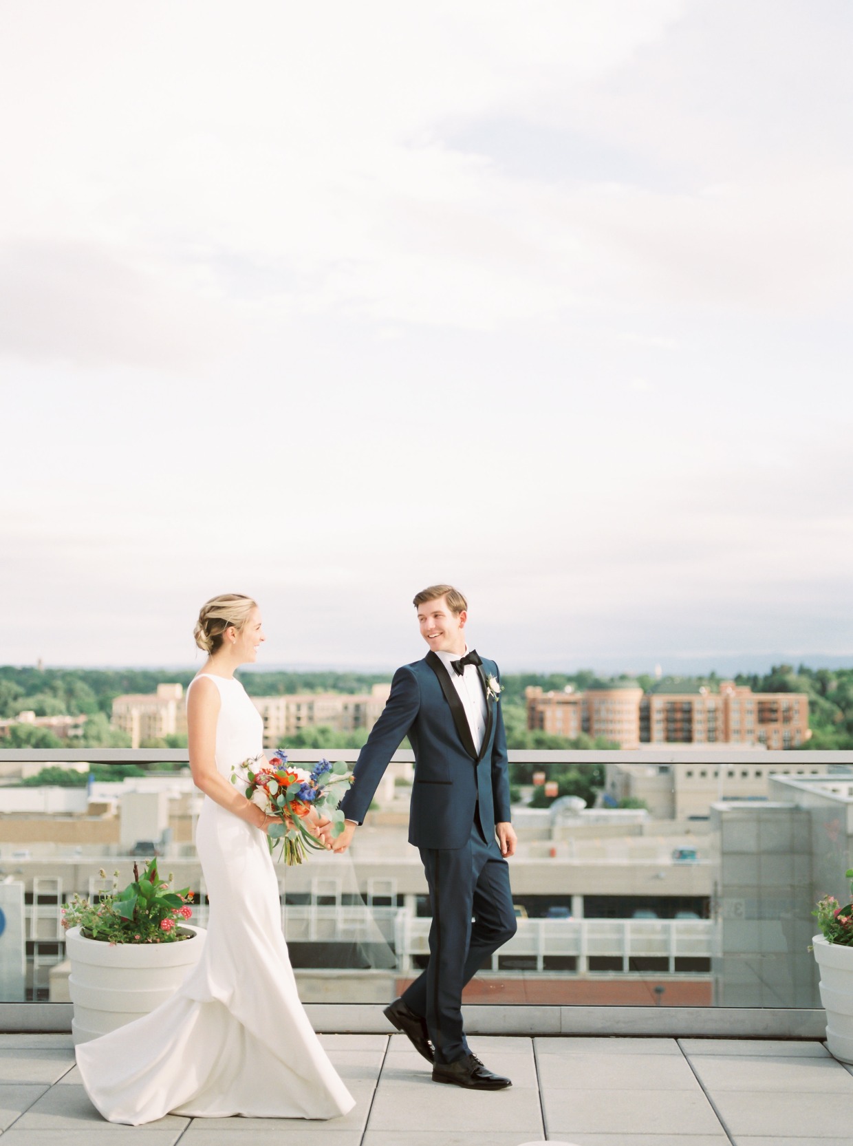 rooftop wedding with the denver skyline in the background
