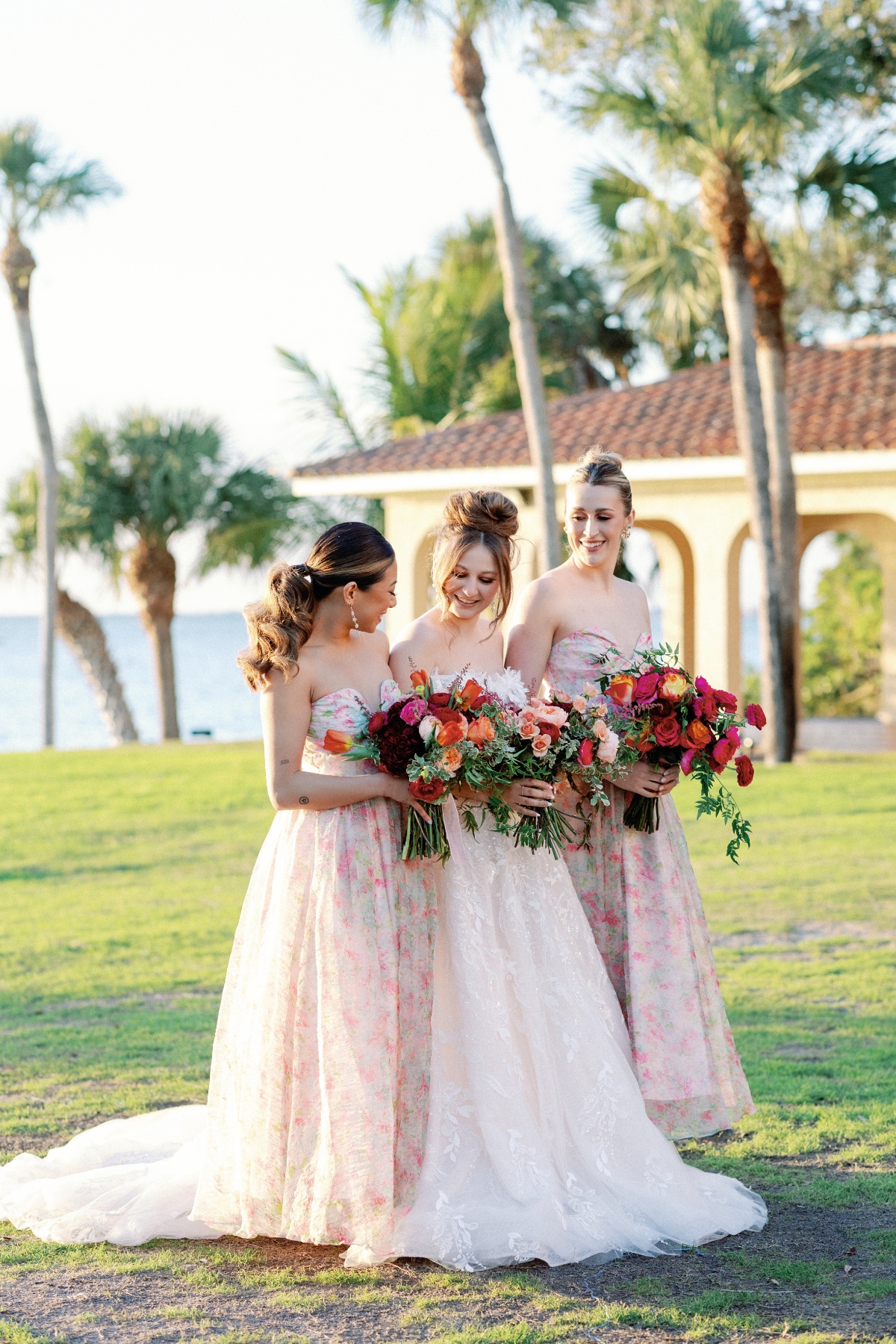 Floral pink and green bridesmaid dresses by Monique Lhuillier