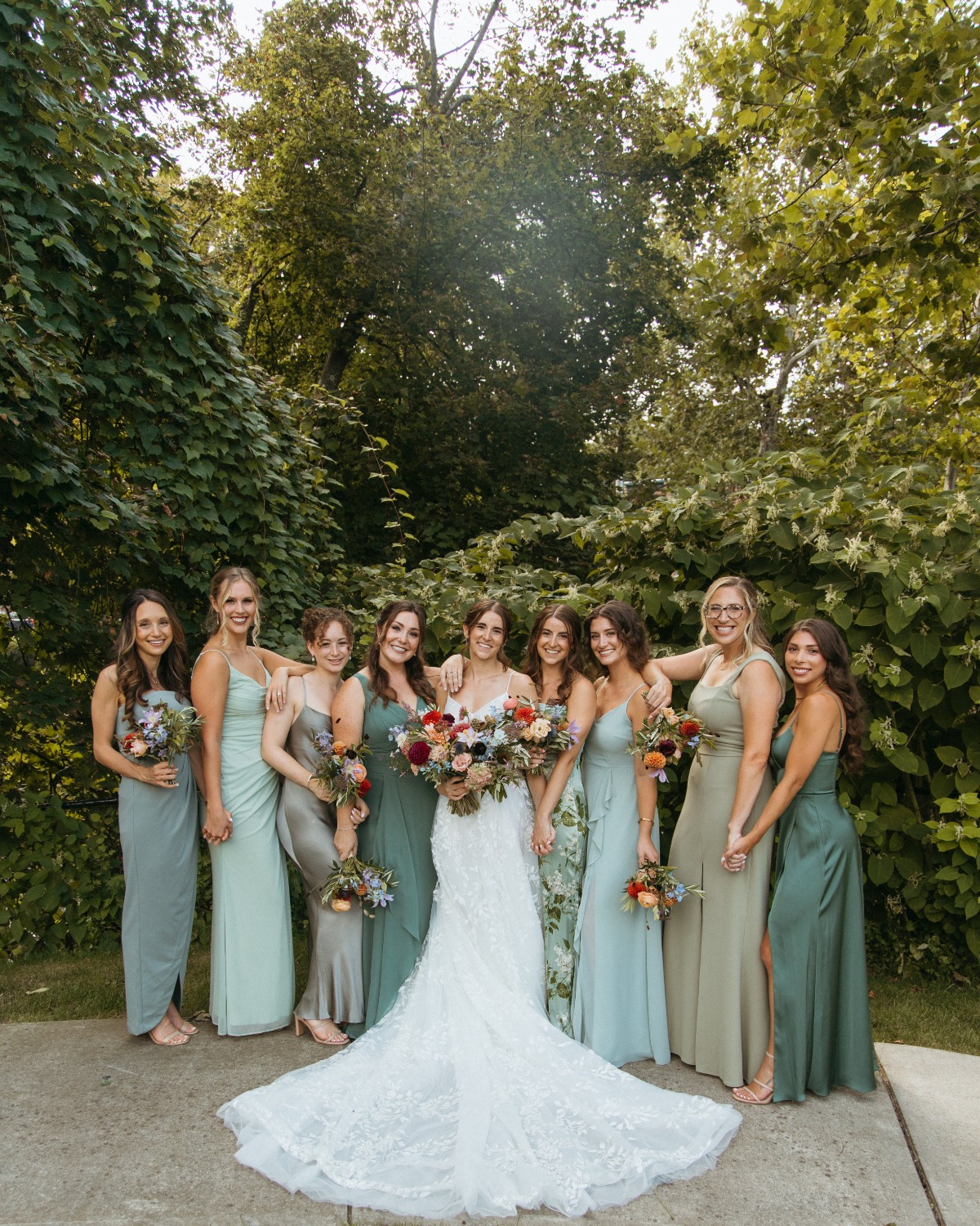 New York bride with bridesmaids in mix and match dresses