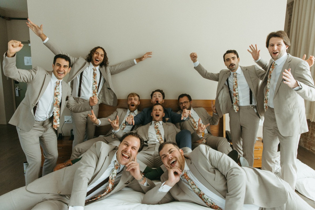 Playful and silly groomsmen photos in Hudson New York 
