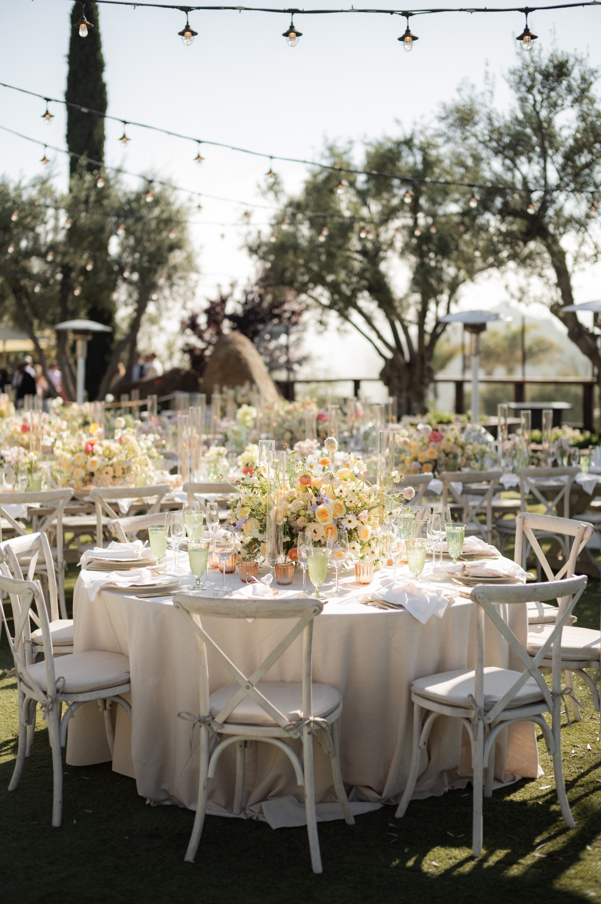colorful spring wedding reception with tall votives