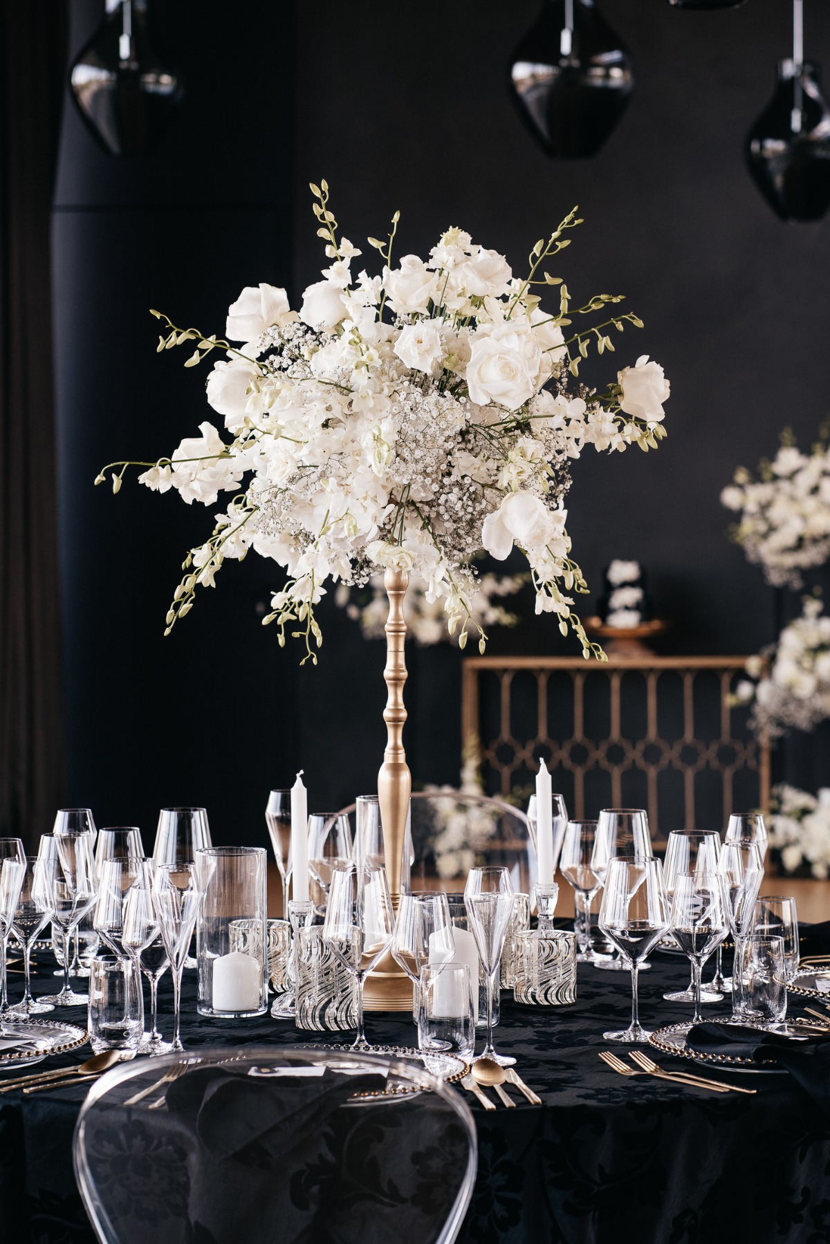 tall white and gold centerpieces