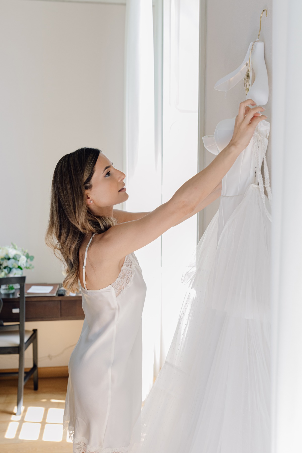 wedding dress hanging photo