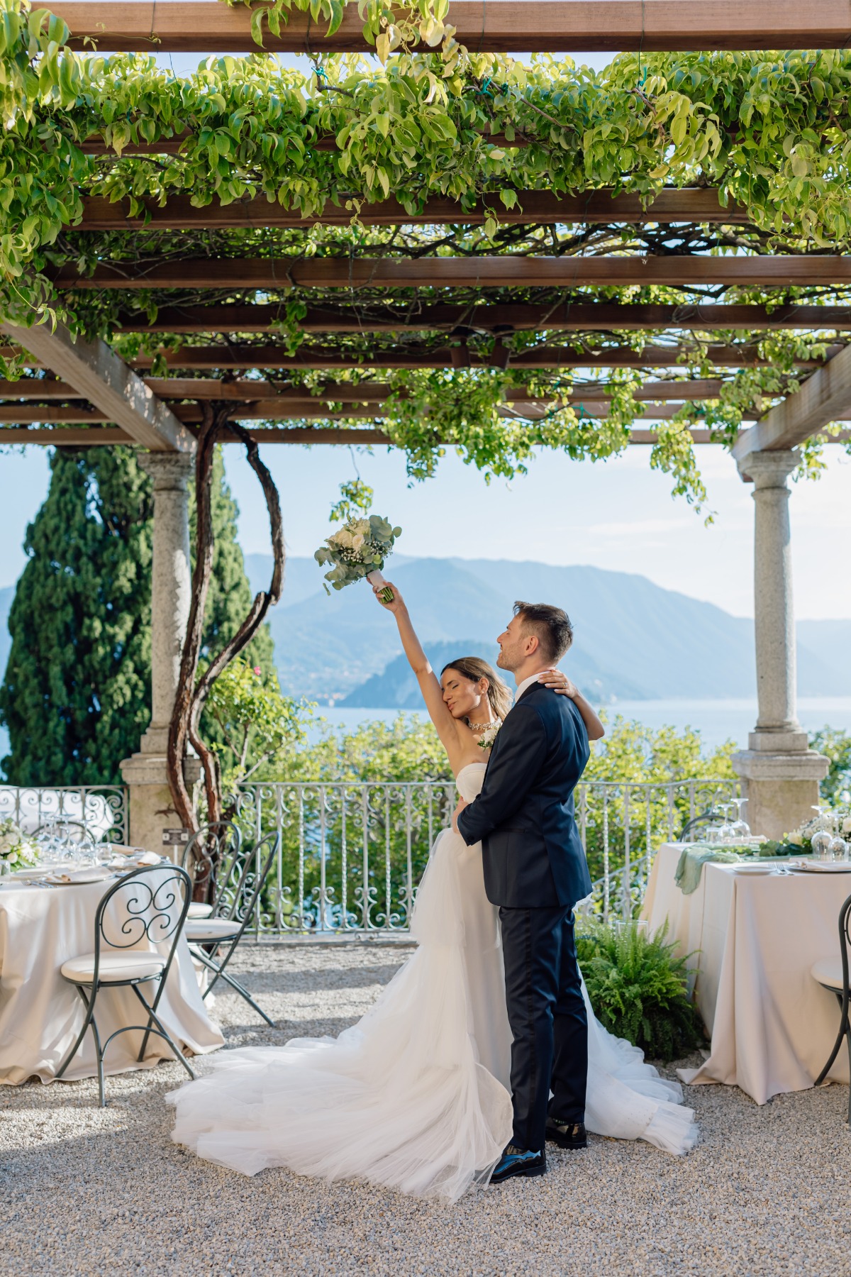 bride and groom at reception on lake como