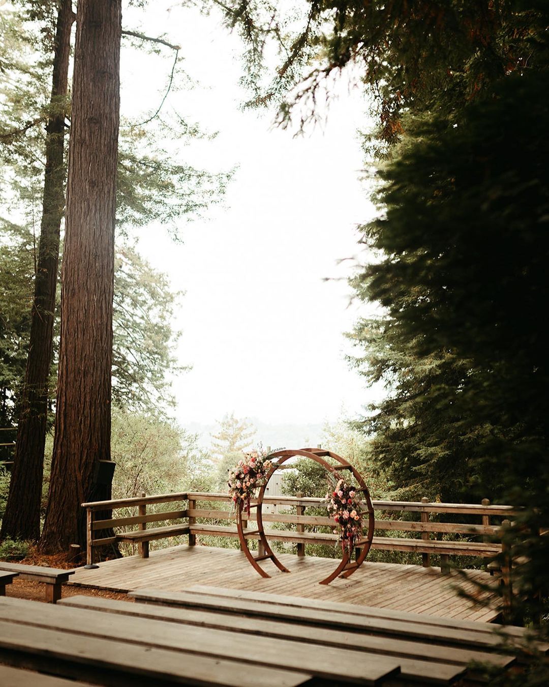 wedding ceremony overlooking redwood forest and monterey bay kennolyn