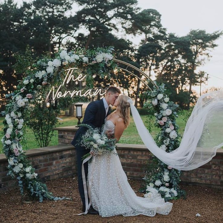 custom wedding ceremony neon sign and arch from one neon