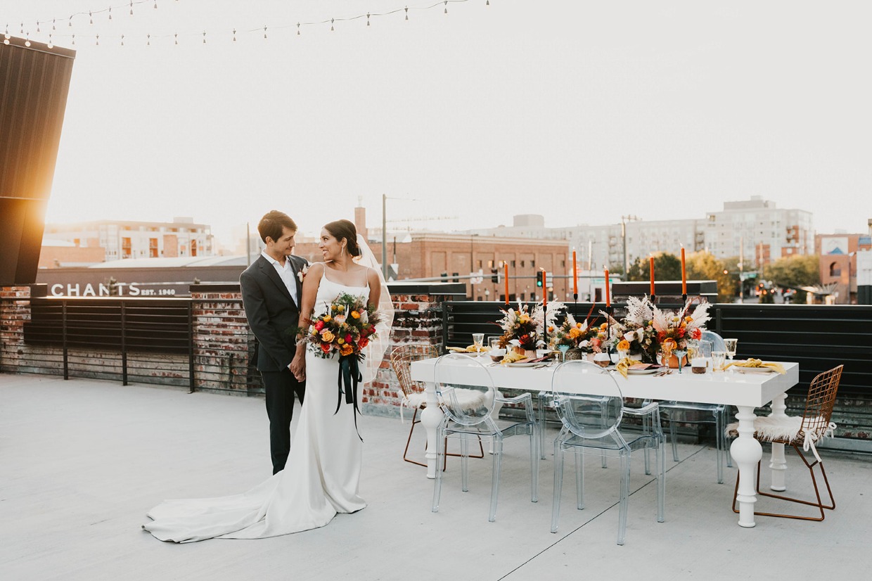 rooftop wedding in denver with skyline in the background