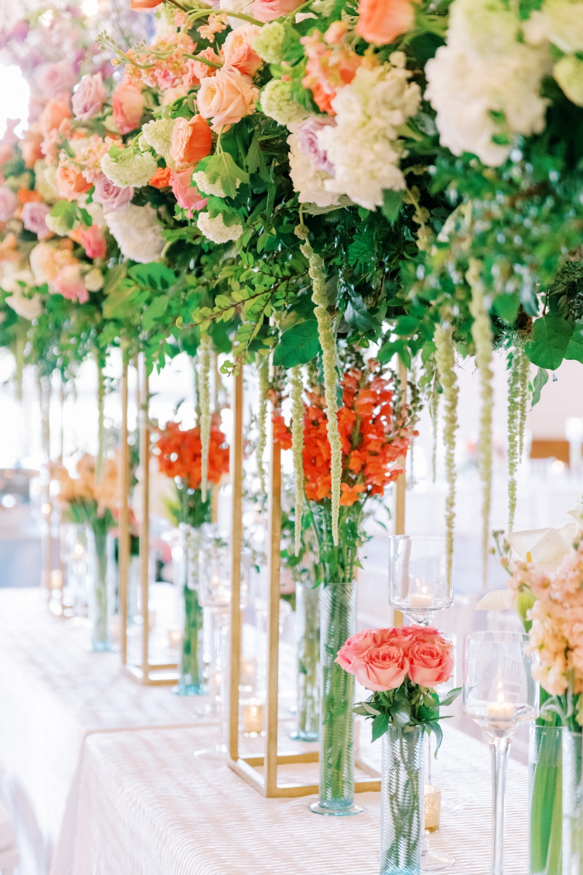 mini centerpieces under tall centerpieces