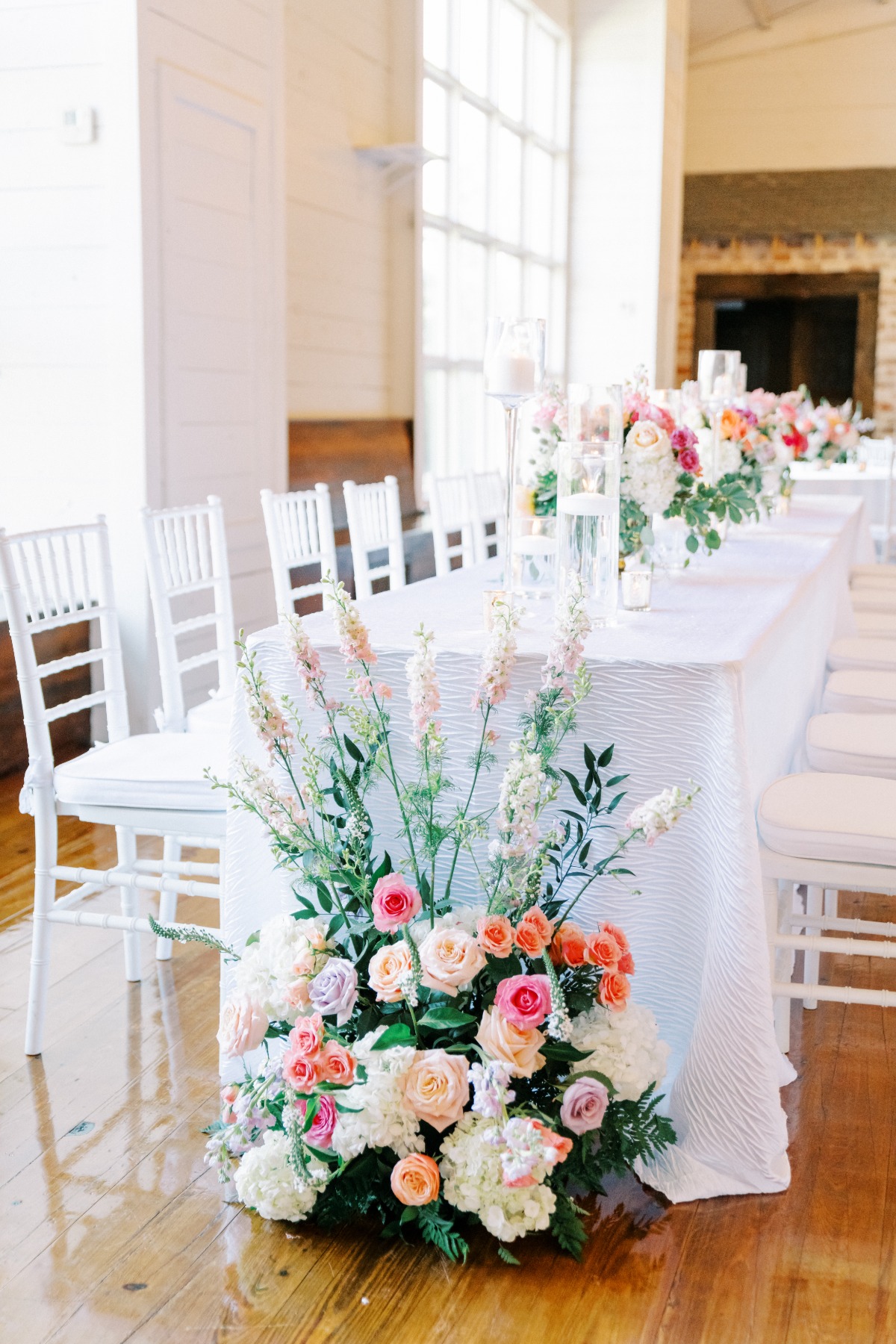end of table floral arrangement on the ground