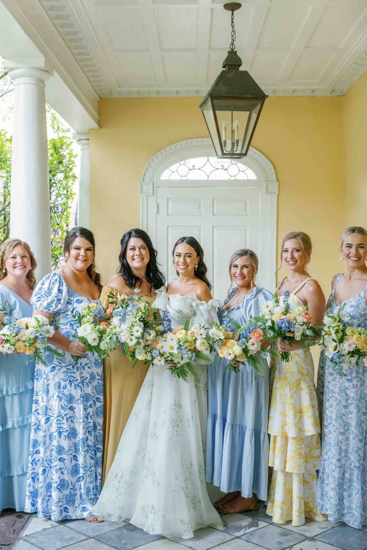 Charleston bride and bridesmaids in pastel floral dresses