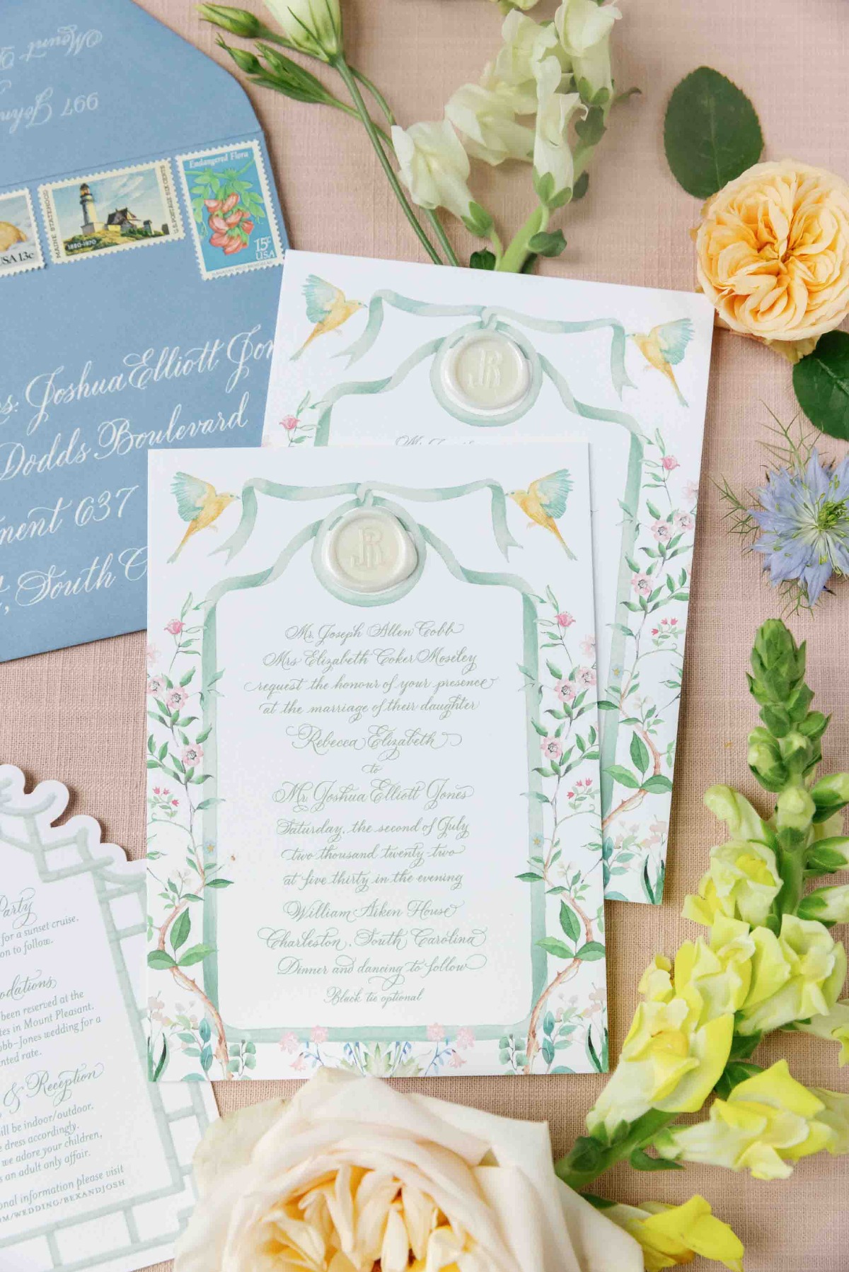 Elegant watercolor wedding invitations with bird motifs