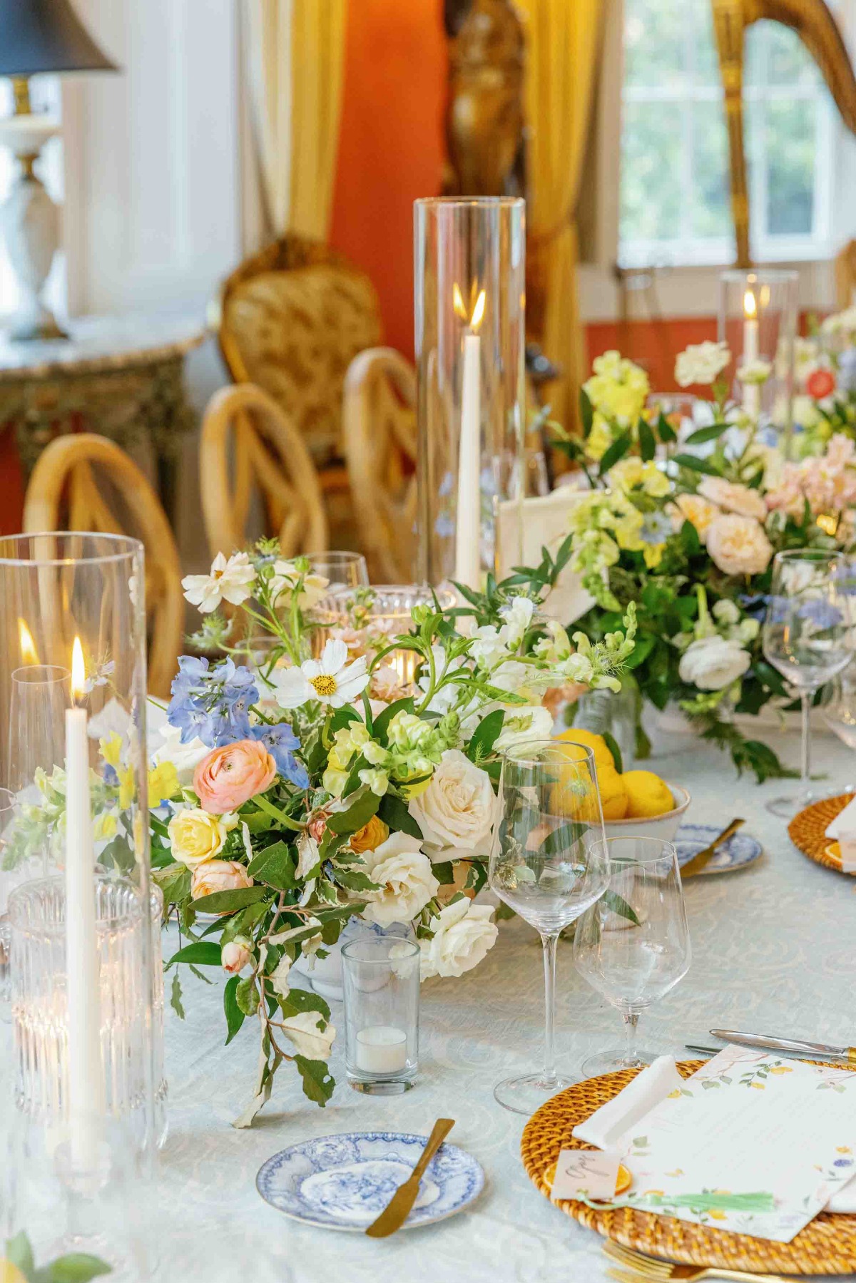 Pastel floral and taper candle centerpieces for garden wedding 