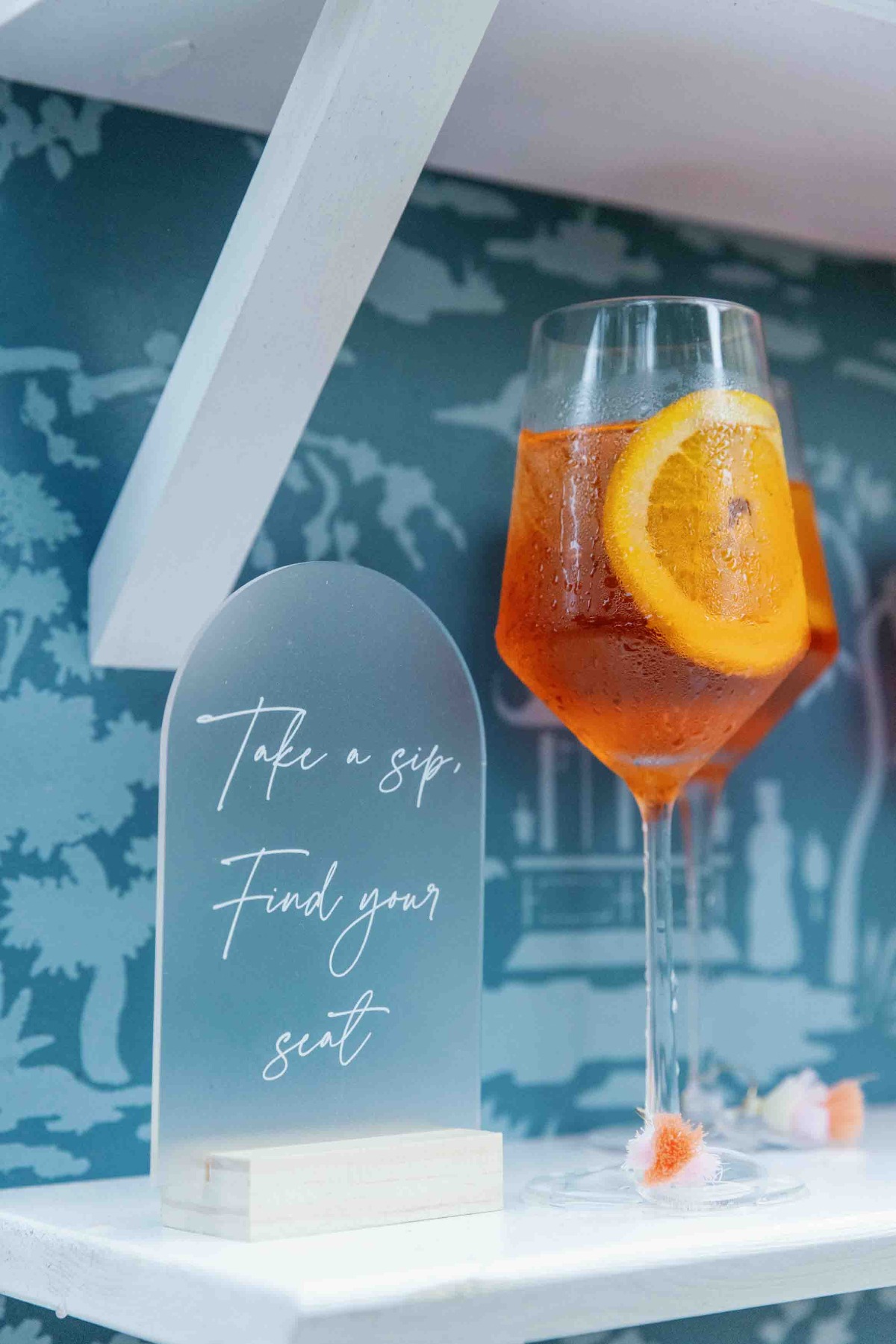 Aperol Spritz escort wall seating chart with custom cocktail